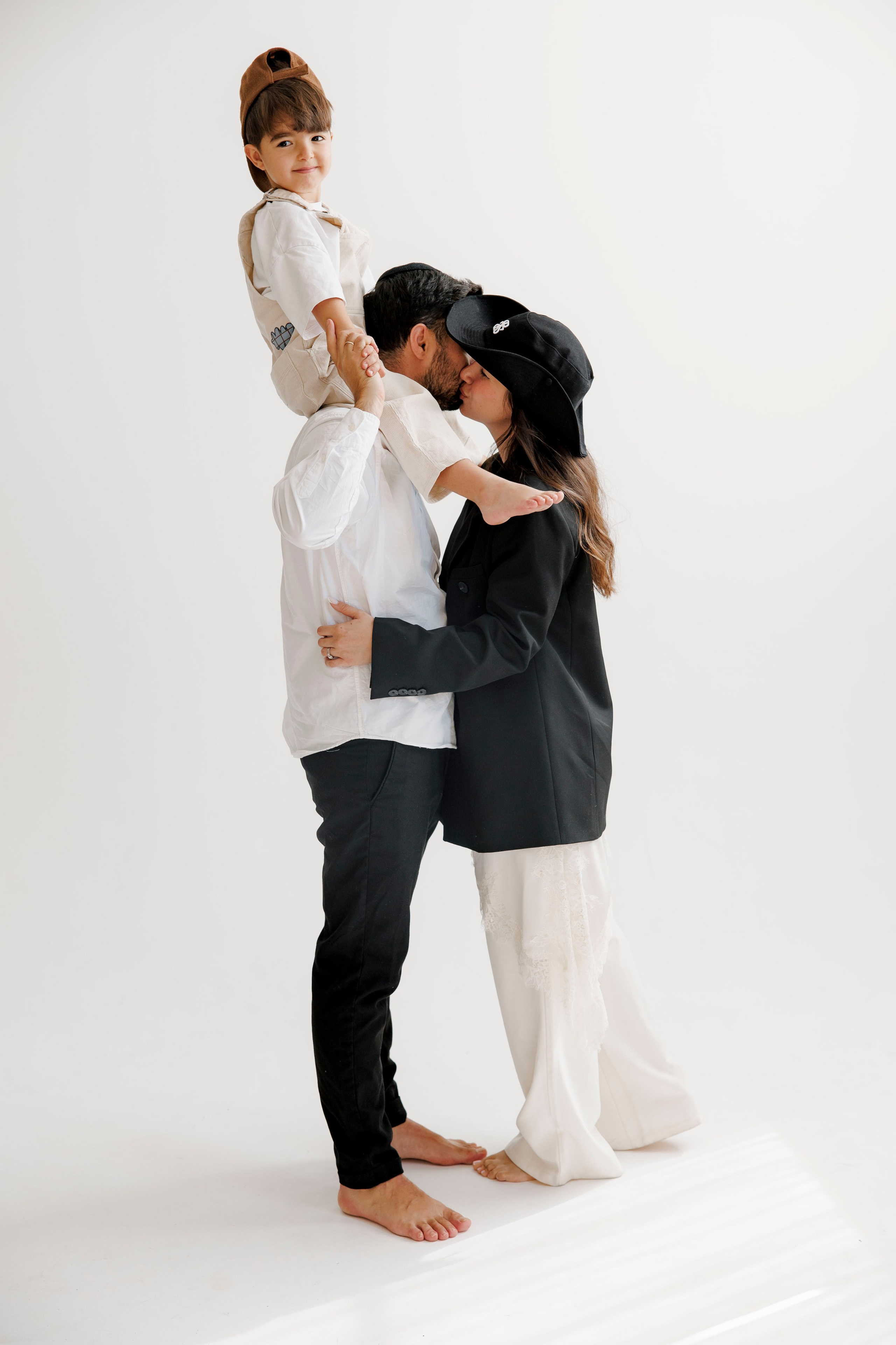 Family photoshoot inside the studio. Wedding and family photographer