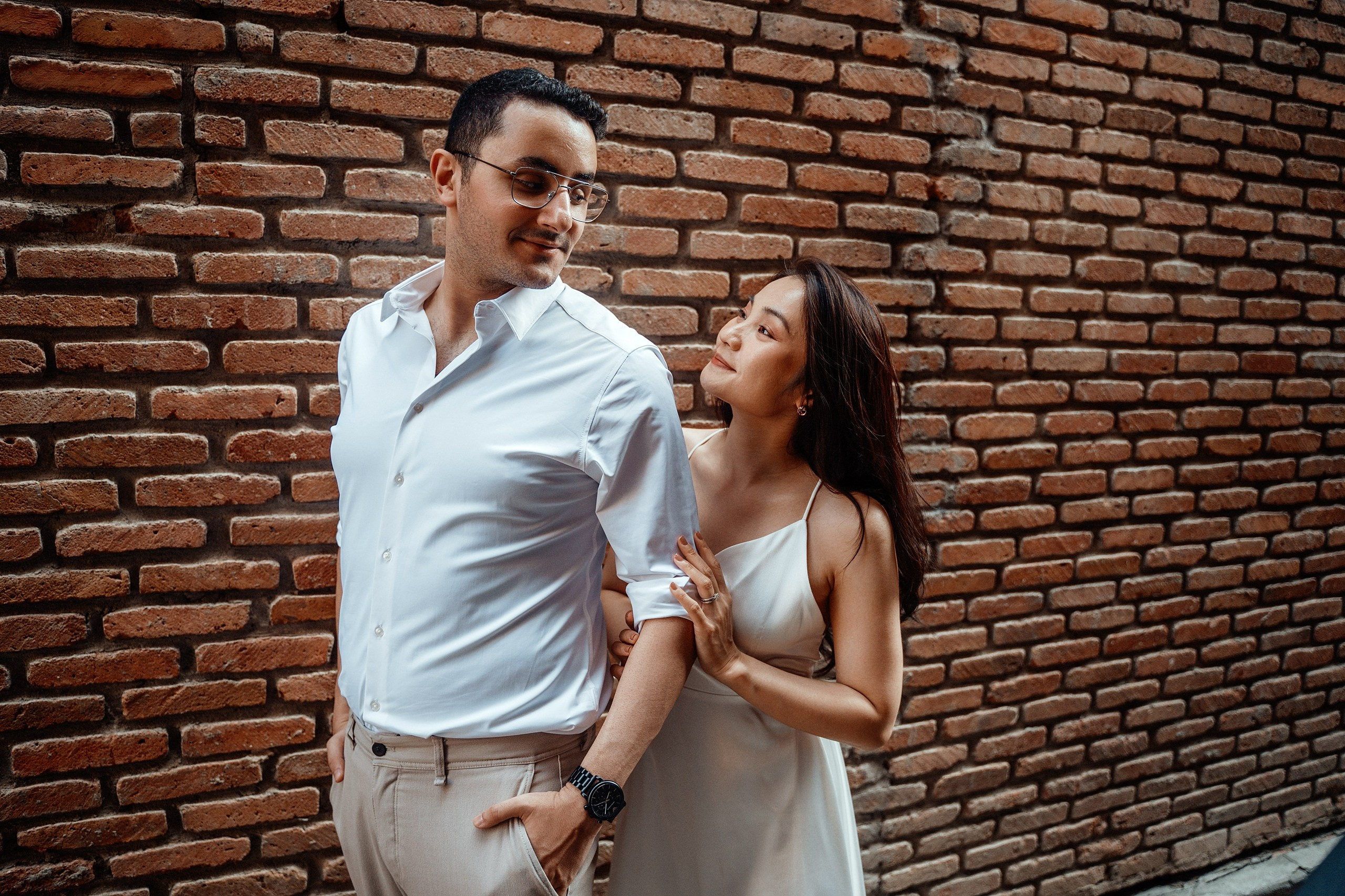 Alaeddine & Matika on the Peace Bridge in Tbilisi. Photographer Sergey Otkrytyi in Batumi & Tbilisi