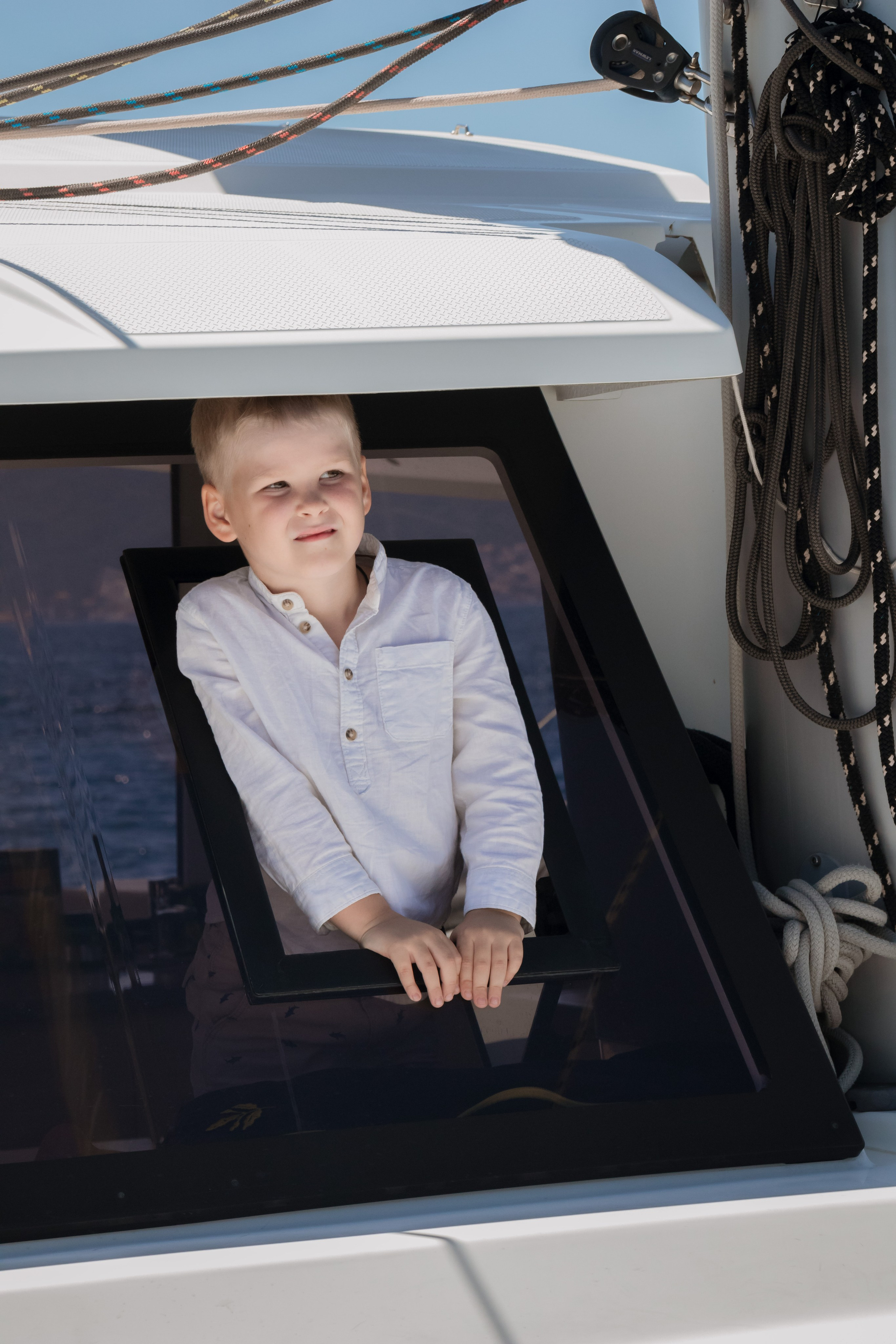 Boat tour with Anna, Roman and Tim. Portrait photographer in Tivat Montenegro Katerina Kirsanova