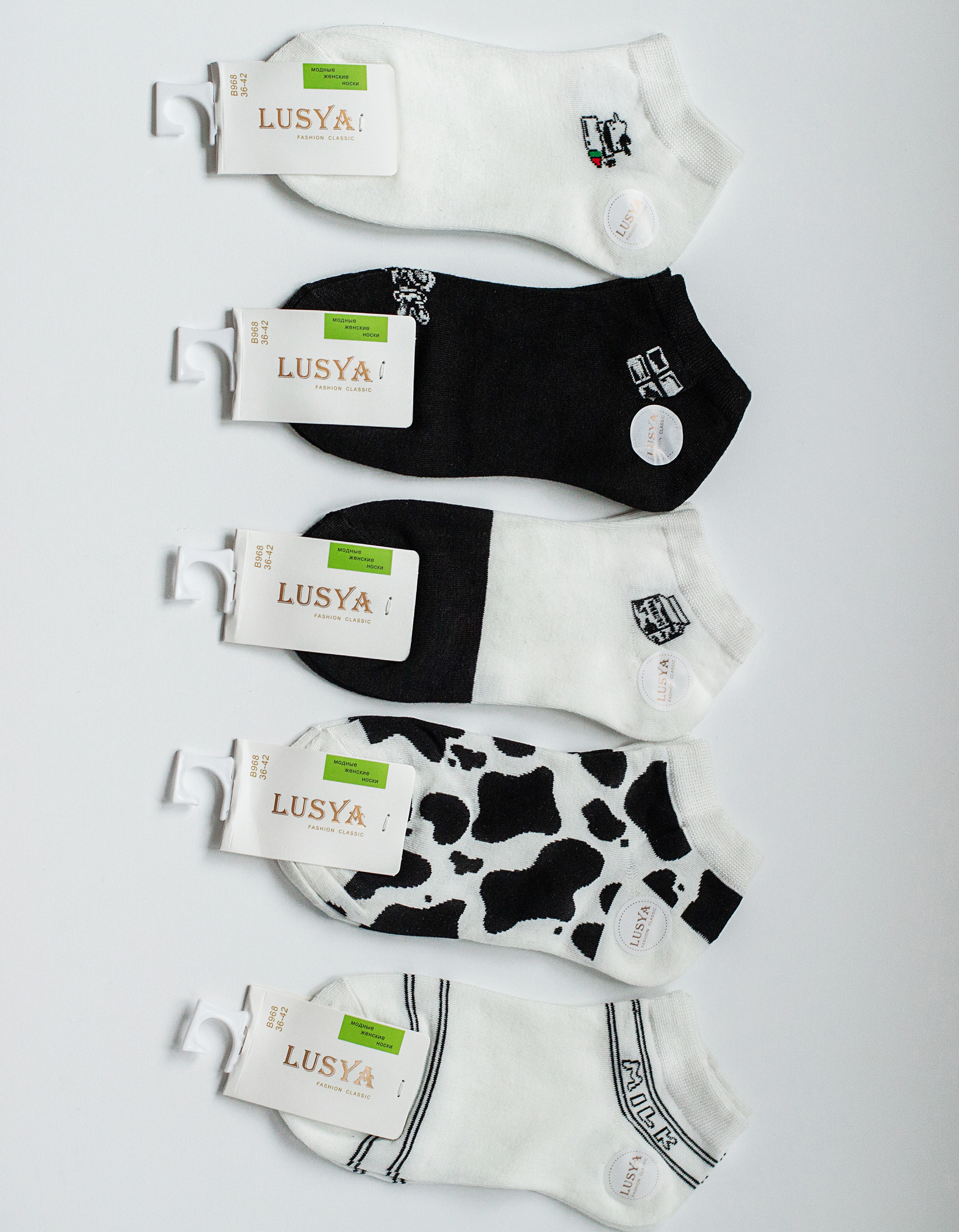 Носочки на белом фоне. Деловая и Бизнес съемка в  Москве Инесса Грушко