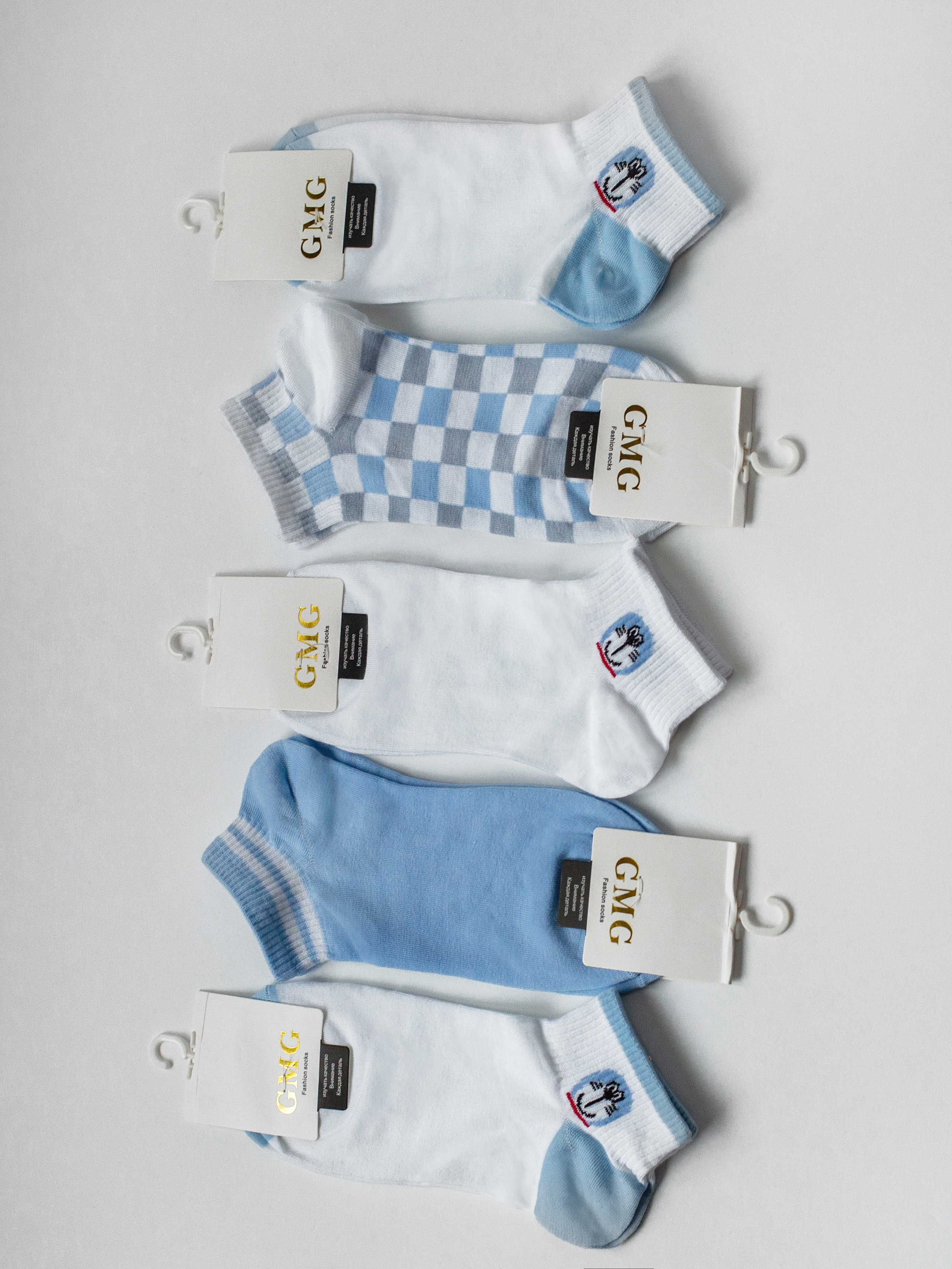 Носочки на белом фоне. Деловая и Бизнес съемка в  Москве Инесса Грушко