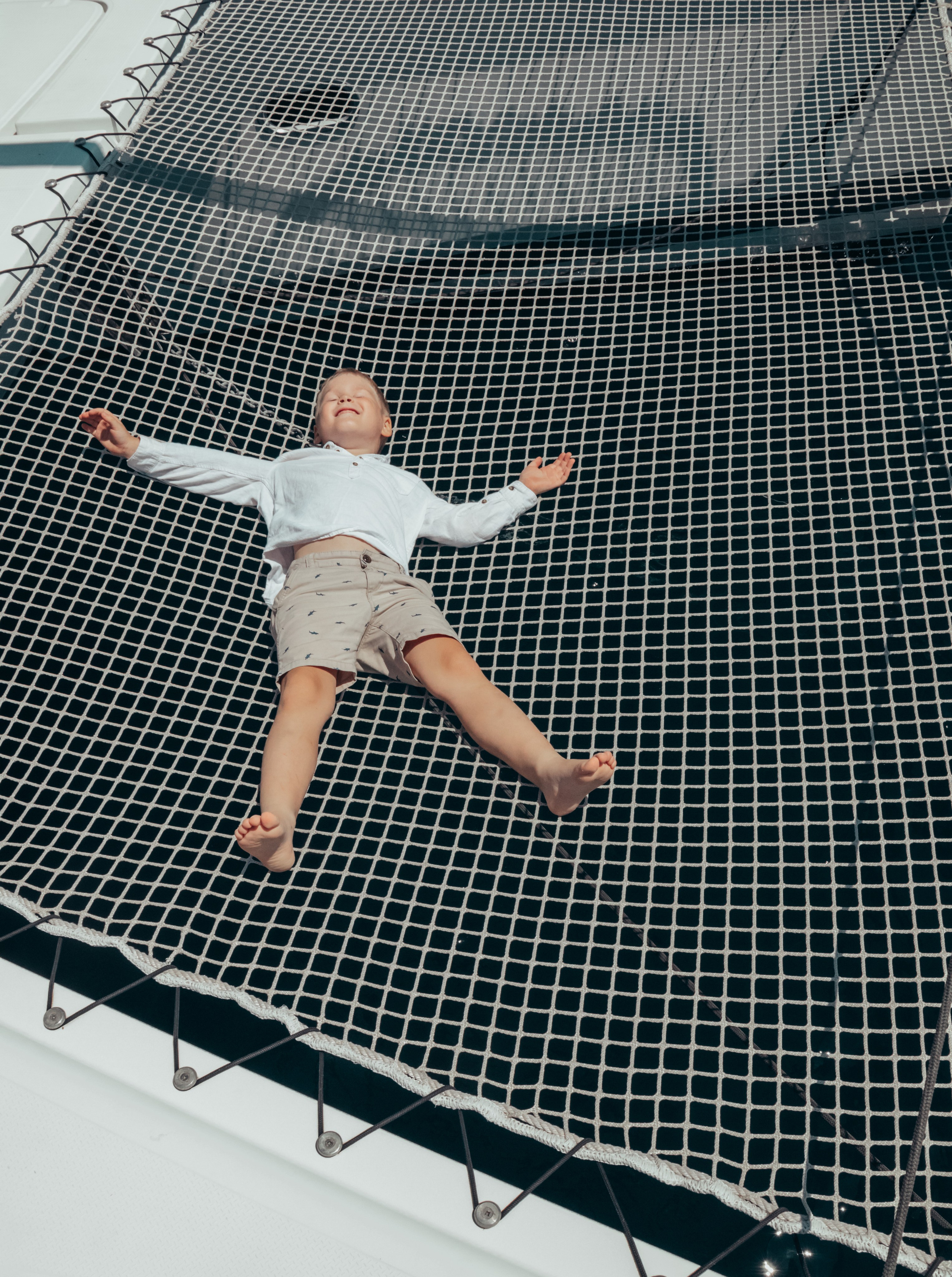 Boat tour with Anna, Roman and Tim. Portrait photographer in Tivat Montenegro Katerina Kirsanova