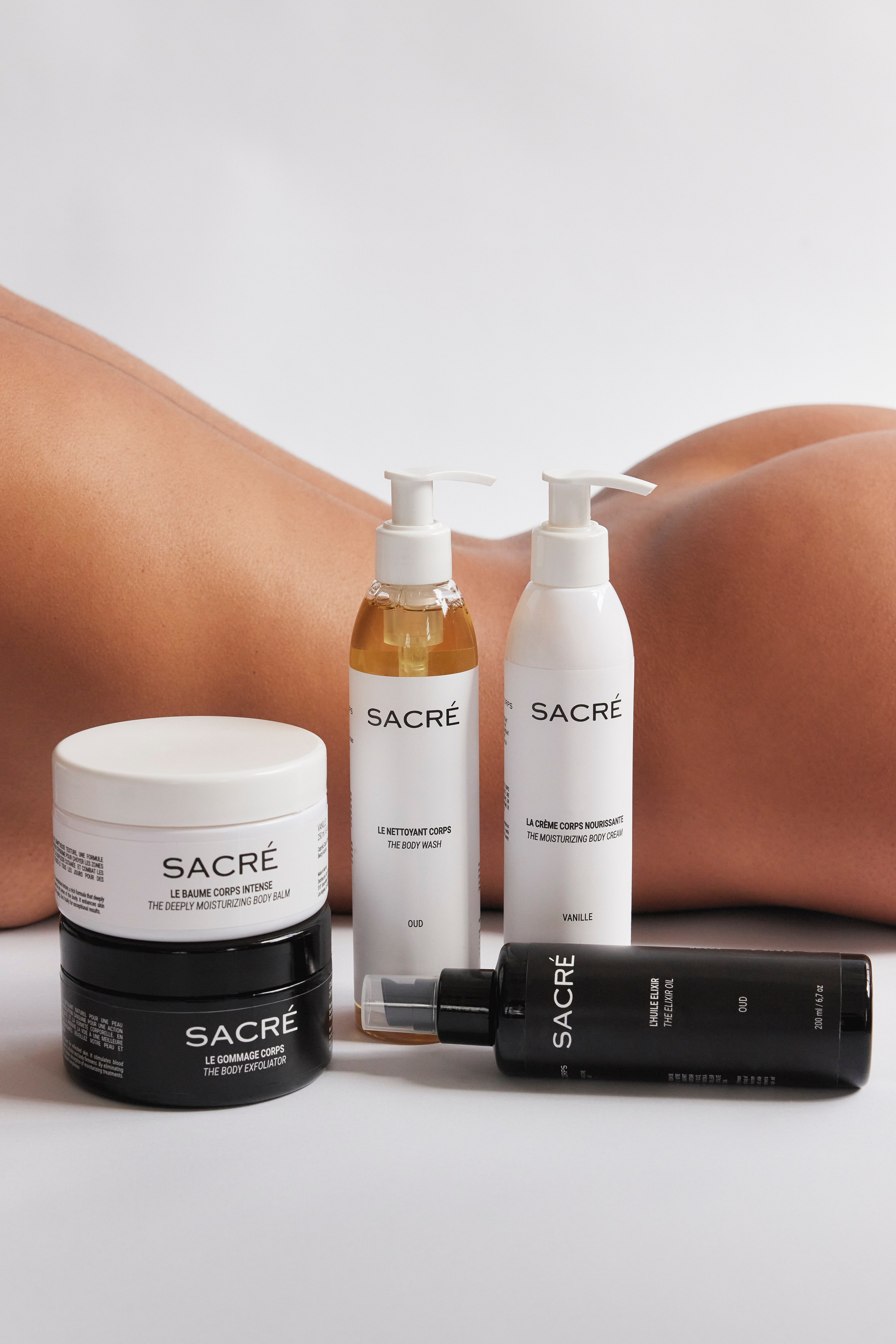 Set of skincare products displayed on a white background, showcasing a luxury beauty collection.