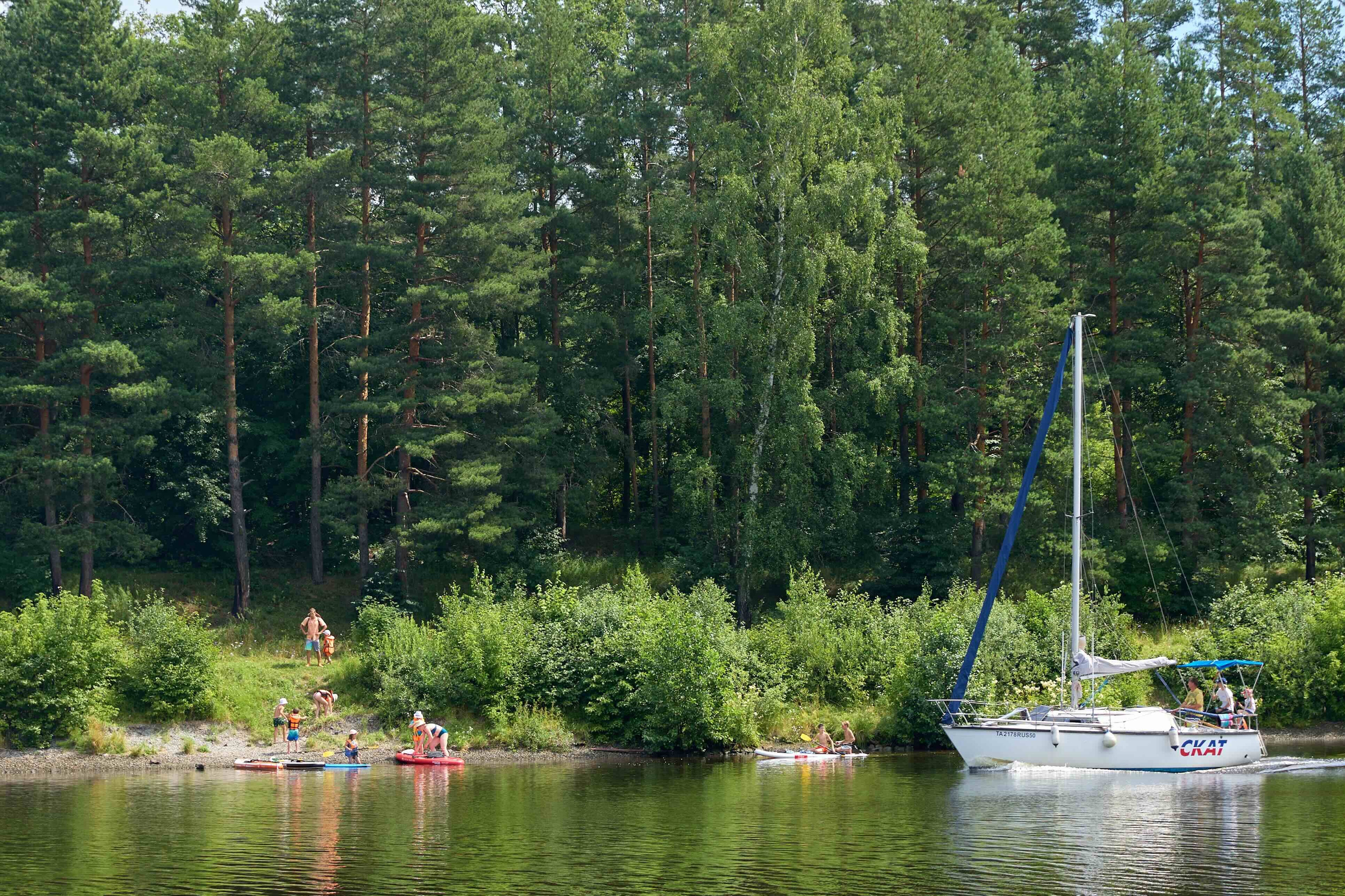 САП-заплыв в деревне: Семейная летняя фотосессия с живыми эмоциями | Magnifico Photo