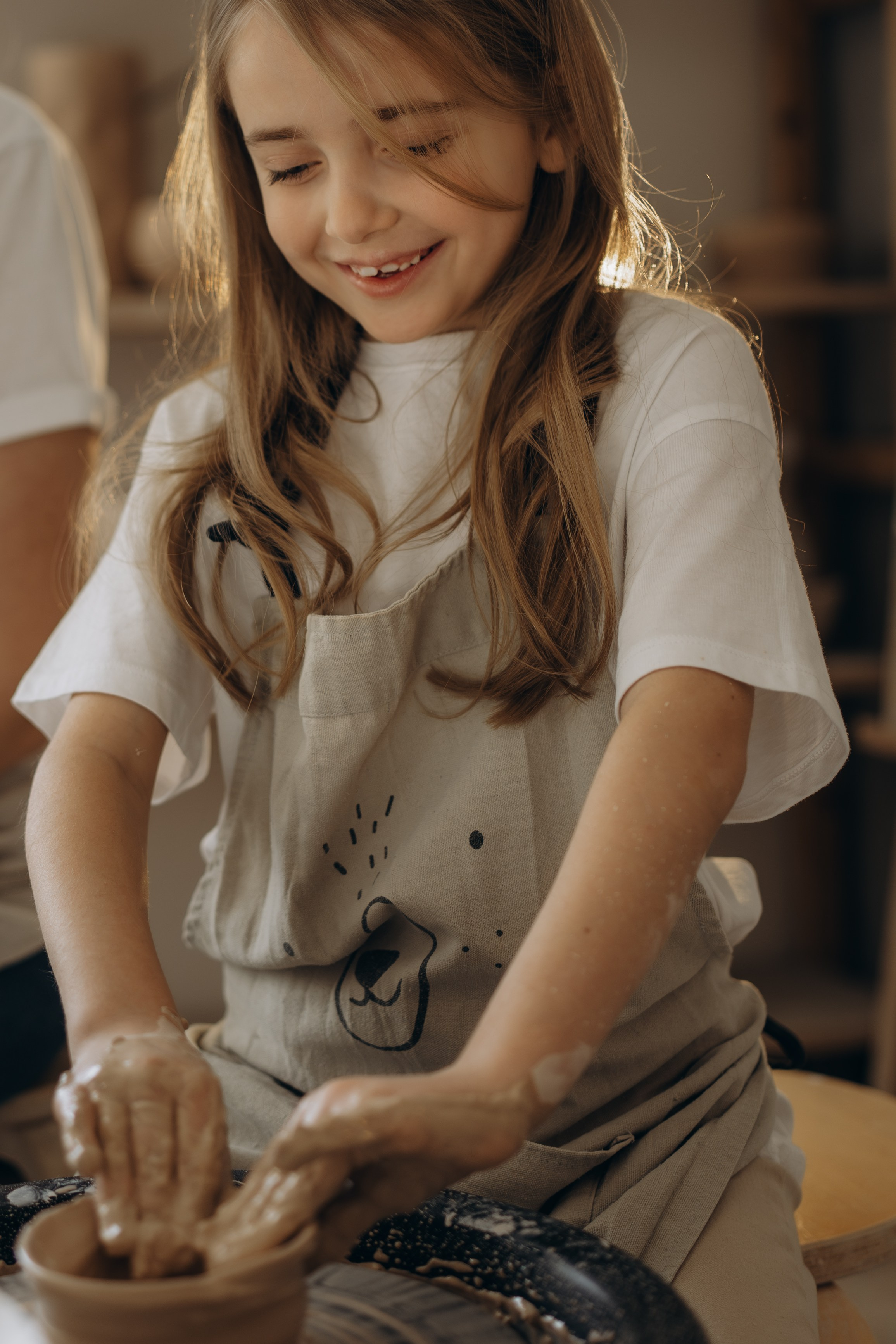 В гончарной мастерской. Семейный фотограф Москва. Фотограф беременности и материнства Москва