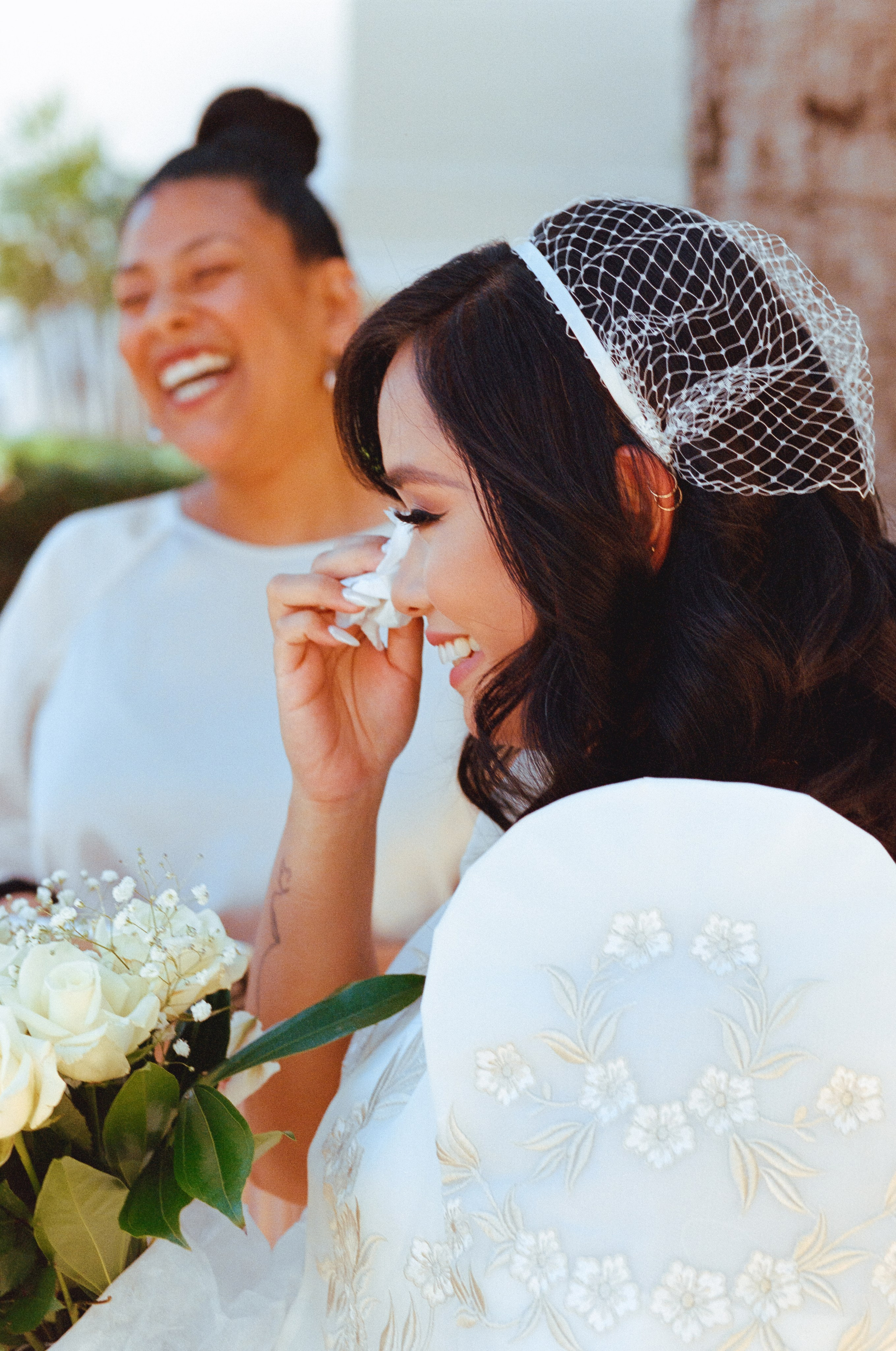 a bride tearing up during the vows
