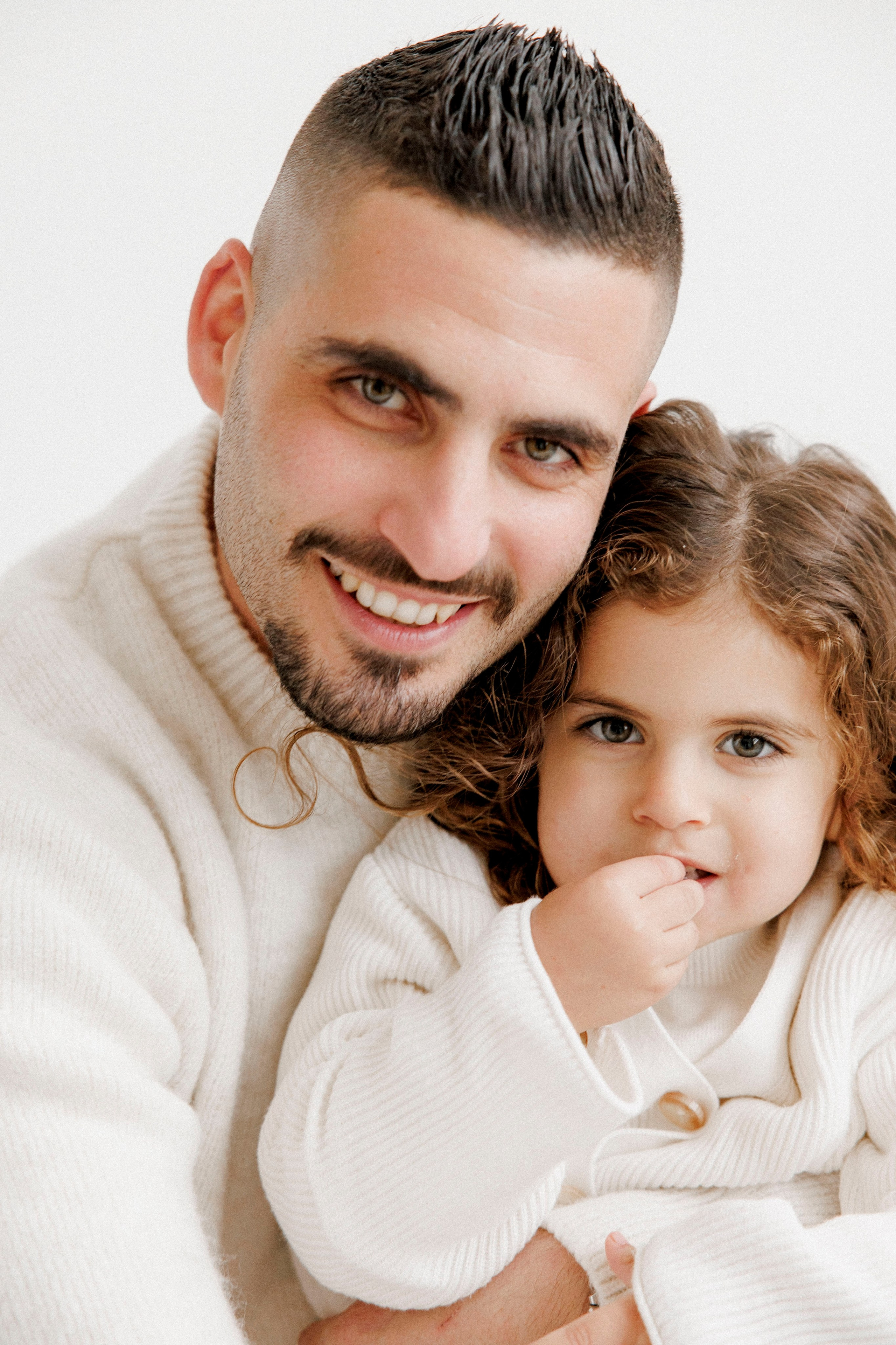 Family photoshoot in White Studio. Wedding and family photographer