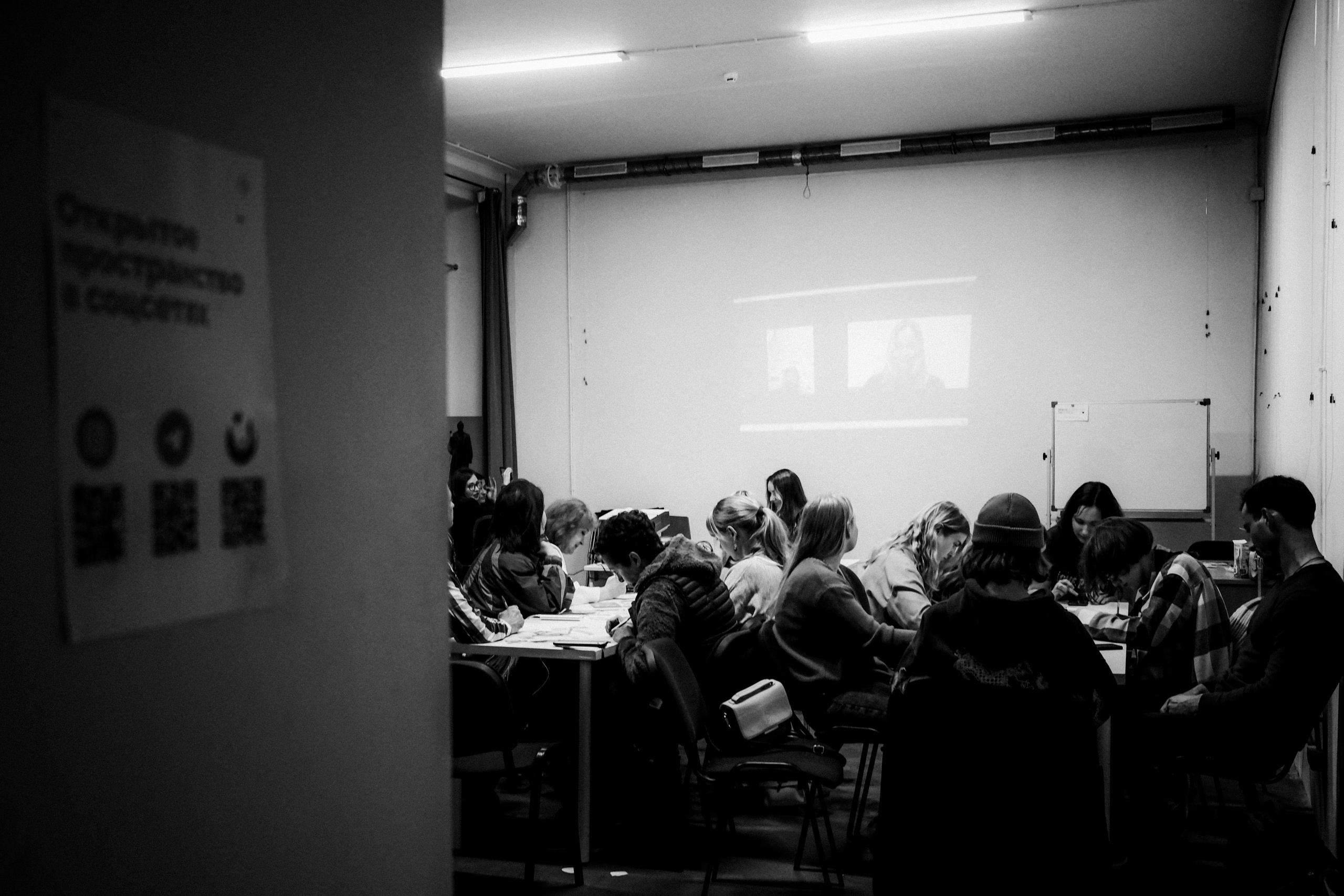 Signing postcards for political prisoners, September 2022. Photographer in Israel Alice Milchin