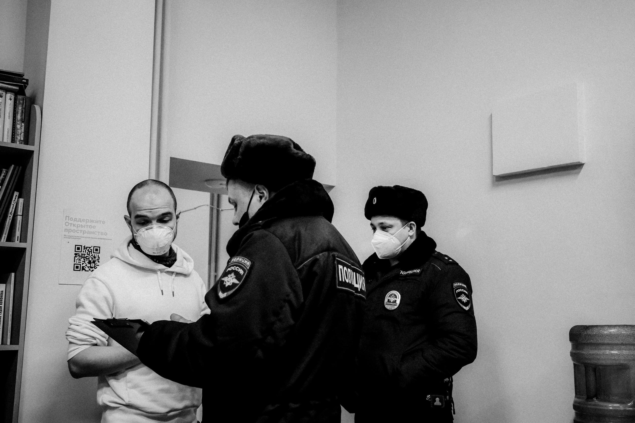 Signing postcards for political prisoners, February 2022. Photographer in Israel Alice Milchin