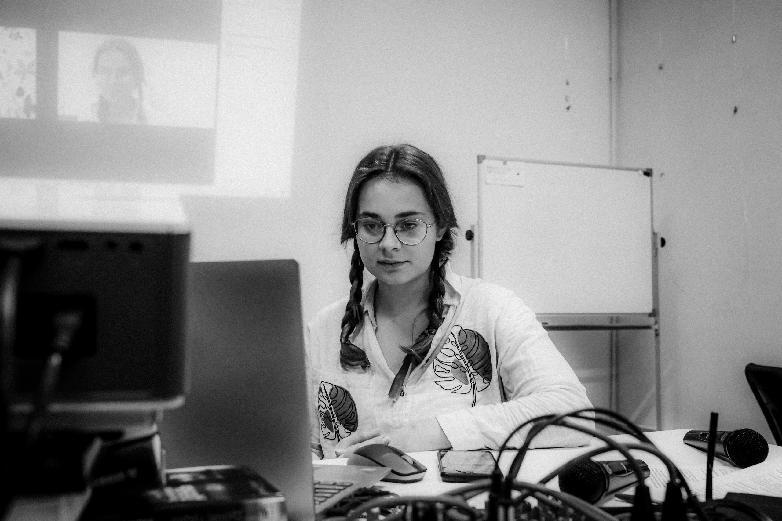 Signing postcards for political prisoners, September 2022. Photographer in Israel Alice Milchin