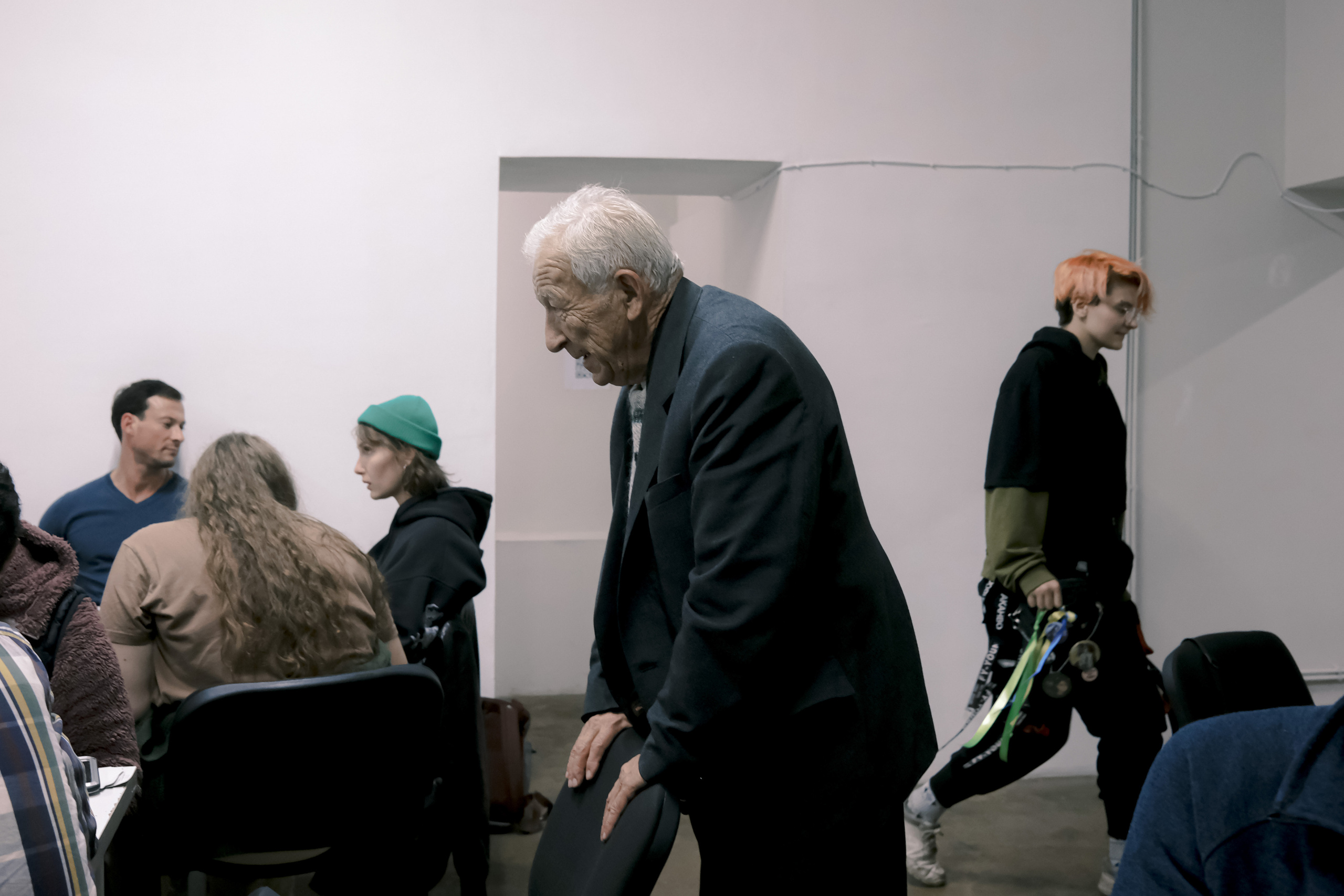 Signing postcards for political prisoners, September 2022. Photographer in Israel Alice Milchin