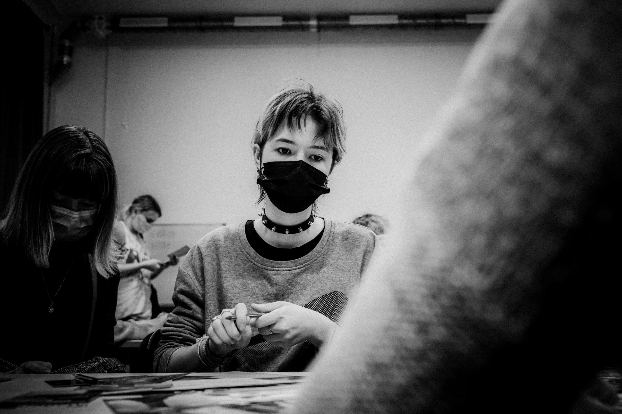 Signing postcards for political prisoners, February 2022. Photographer in Israel Alice Milchin