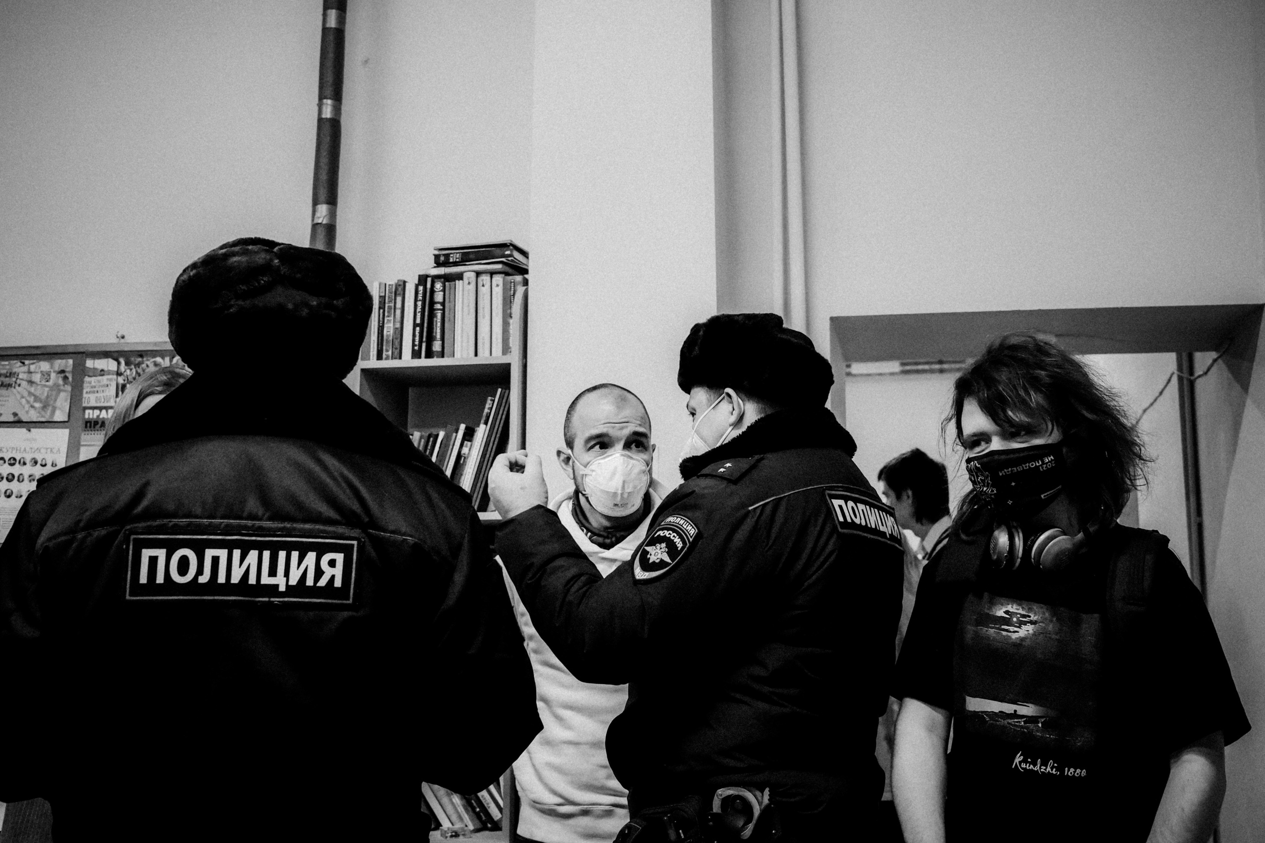 Signing postcards for political prisoners, February 2022. Photographer in Israel Alice Milchin