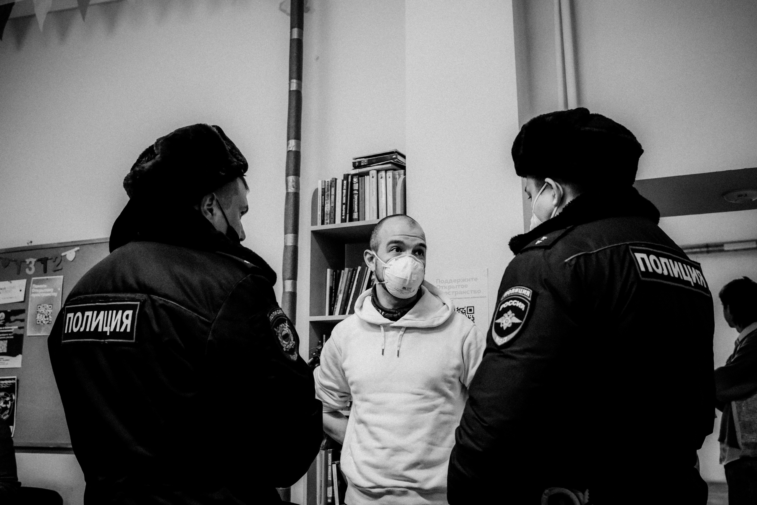 Signing postcards for political prisoners, February 2022. Photographer in Israel Alice Milchin