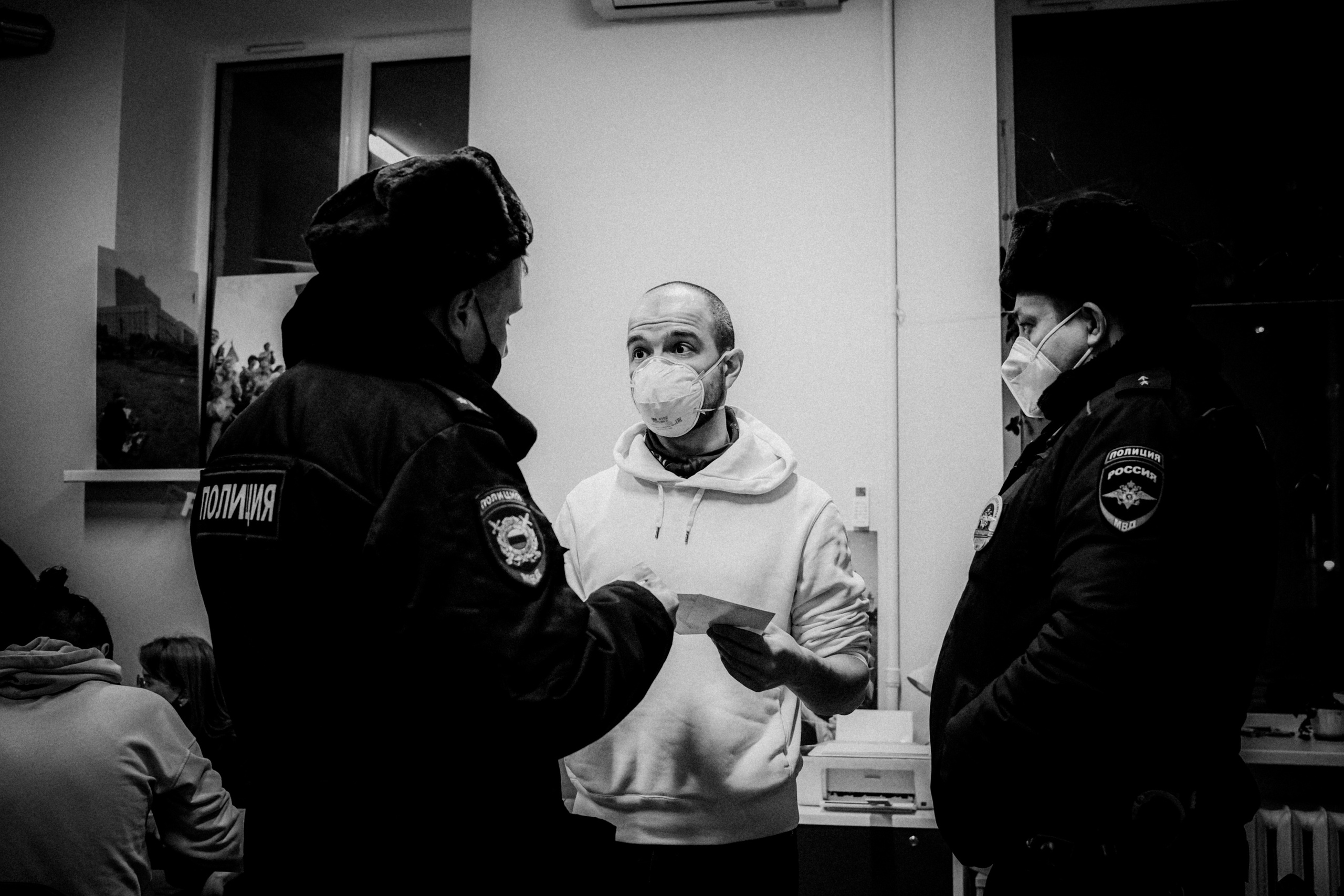 Signing postcards for political prisoners, February 2022. Photographer in Israel Alice Milchin