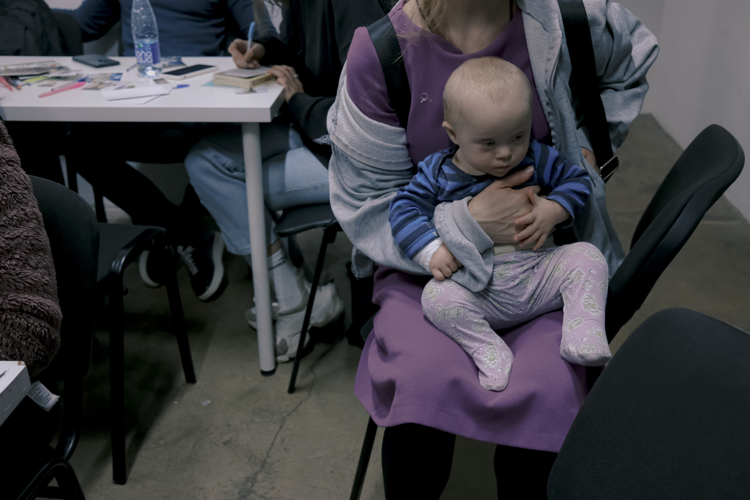 Signing postcards for political prisoners, September 2022. Photographer in Israel Alice Milchin