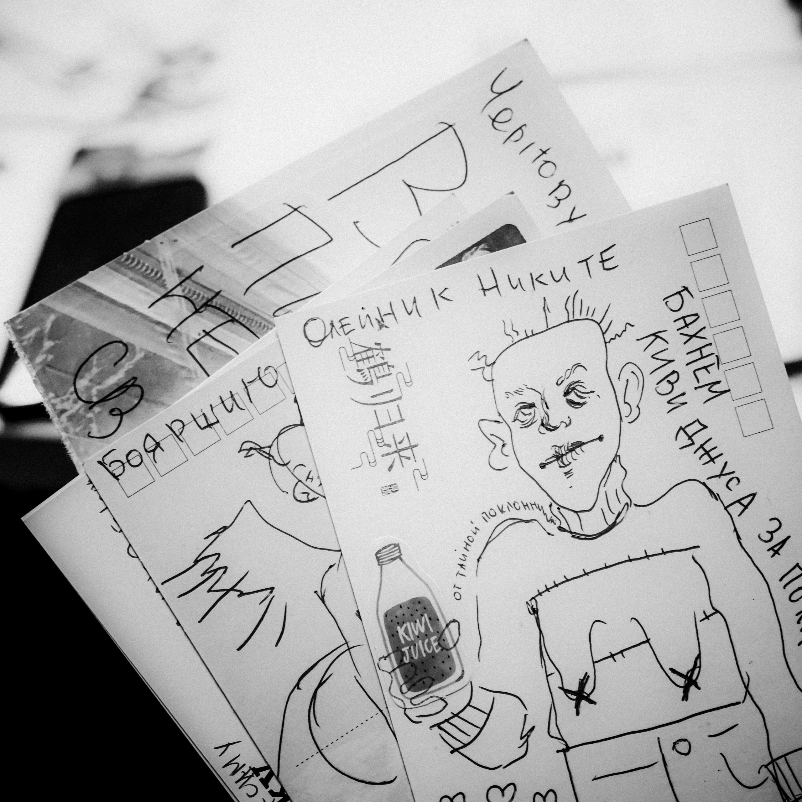 Signing postcards for political prisoners, September 2022. Photographer in Israel Alice Milchin