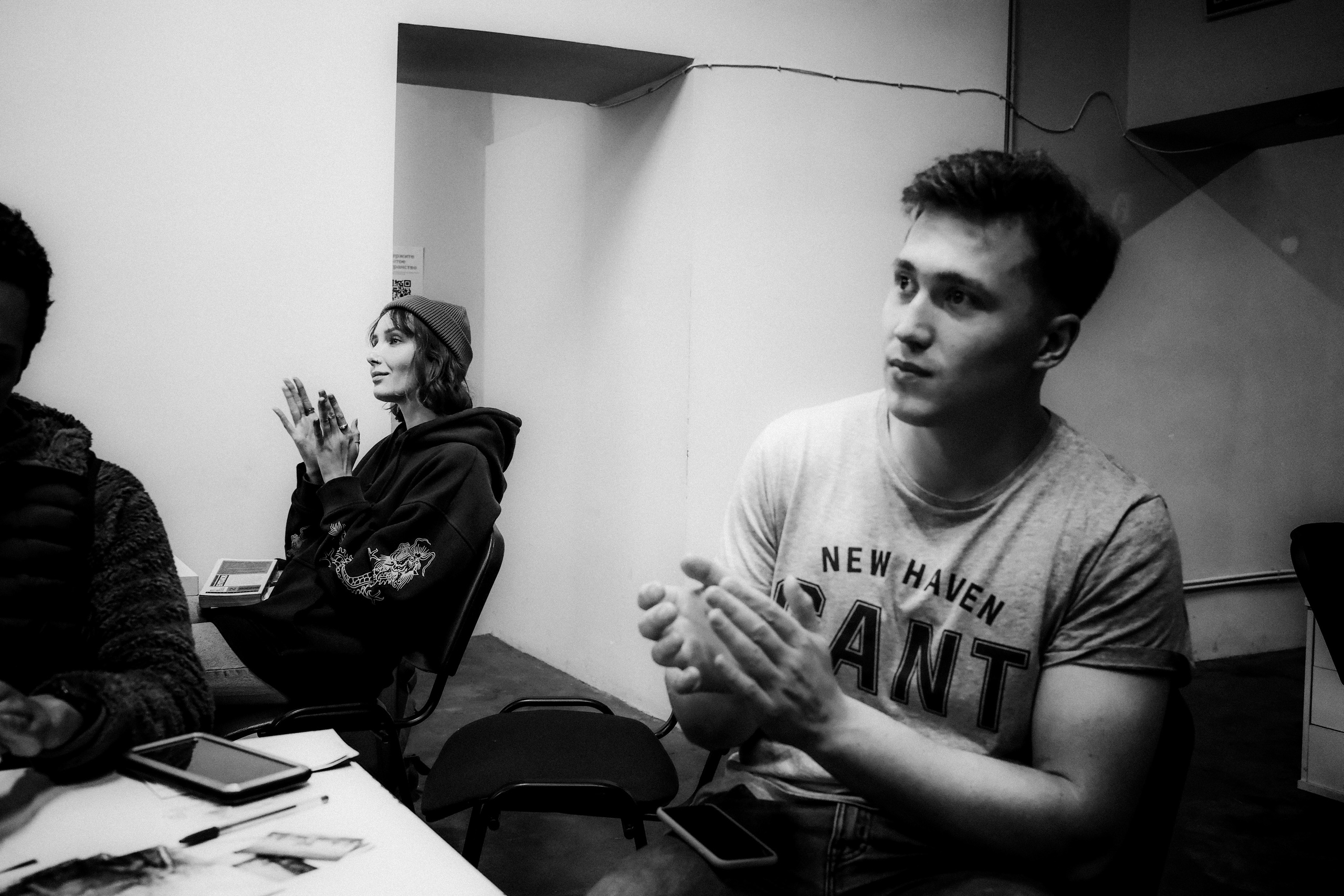 Signing postcards for political prisoners, September 2022. Photographer in Israel Alice Milchin