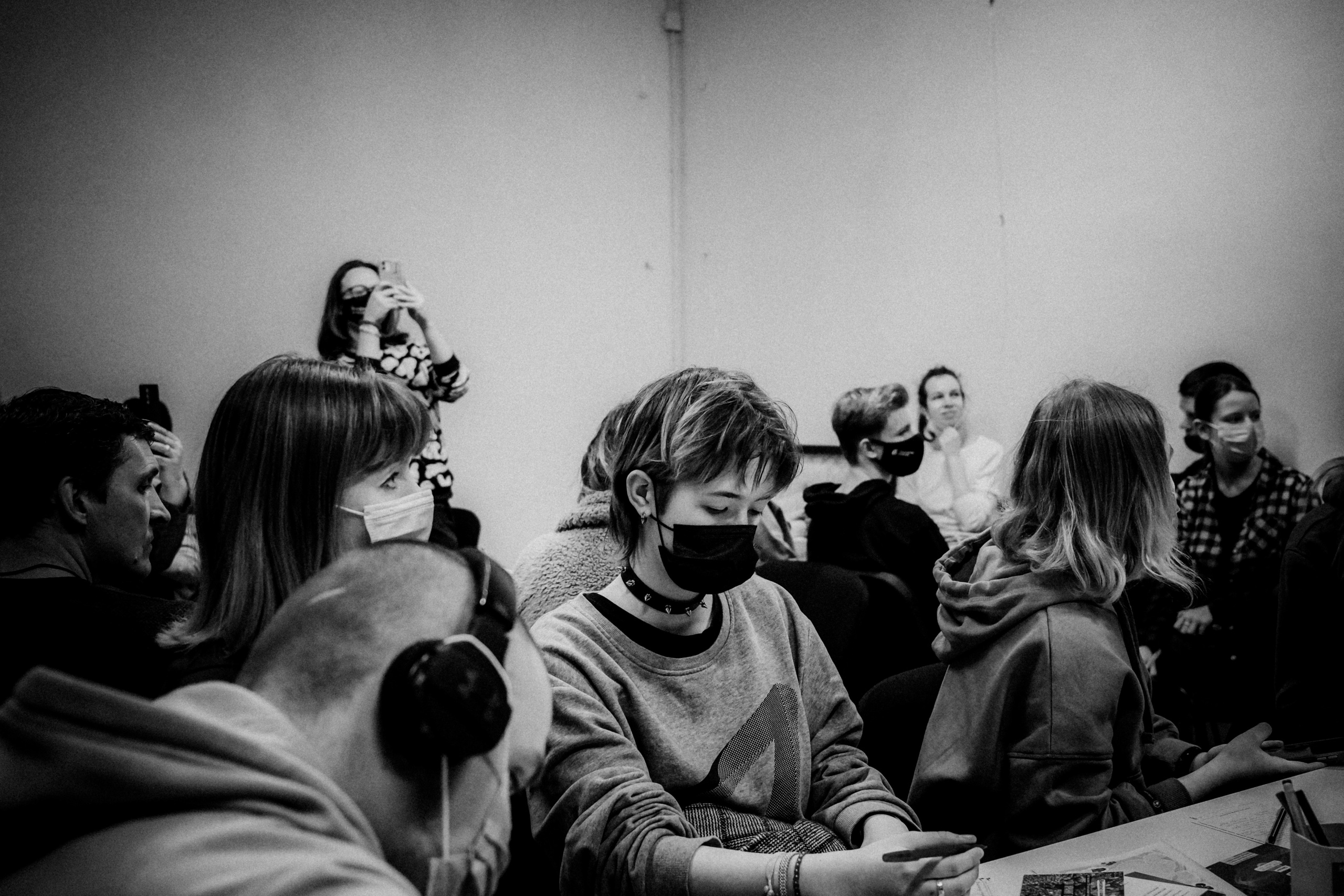 Signing postcards for political prisoners, February 2022. Photographer in Israel Alice Milchin