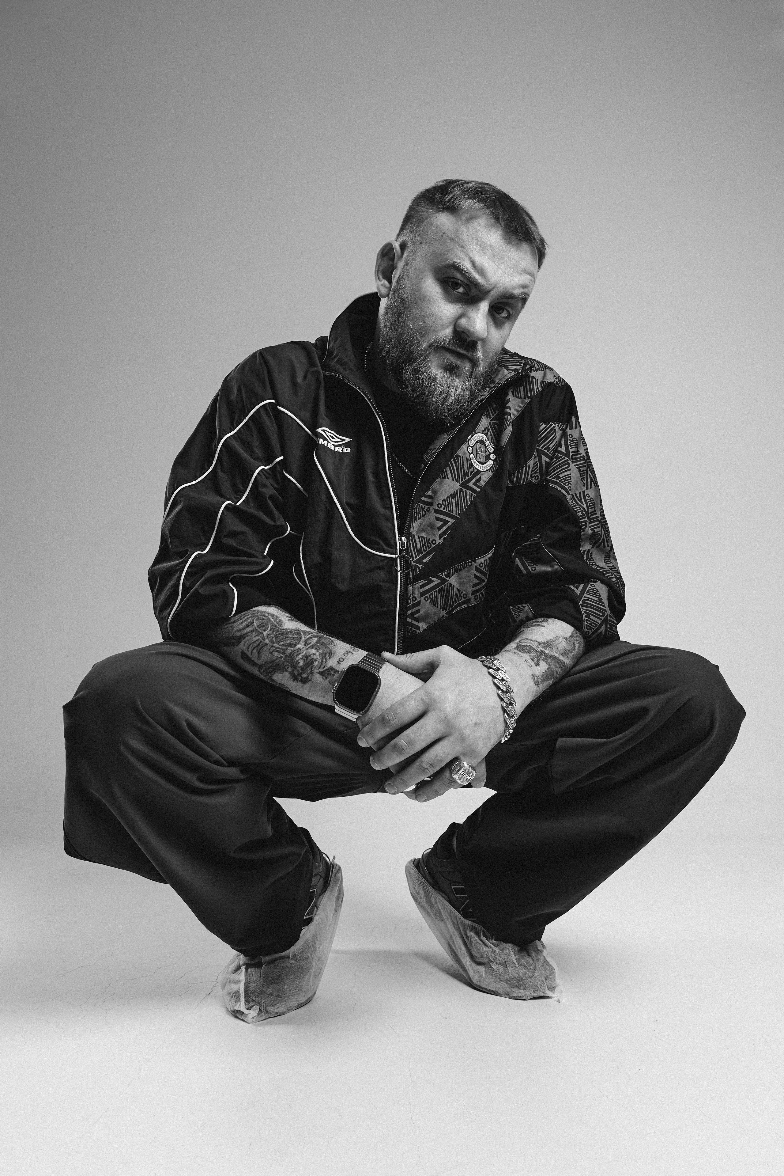 Clean corporate-style headshot photographed in a Barcelona studio