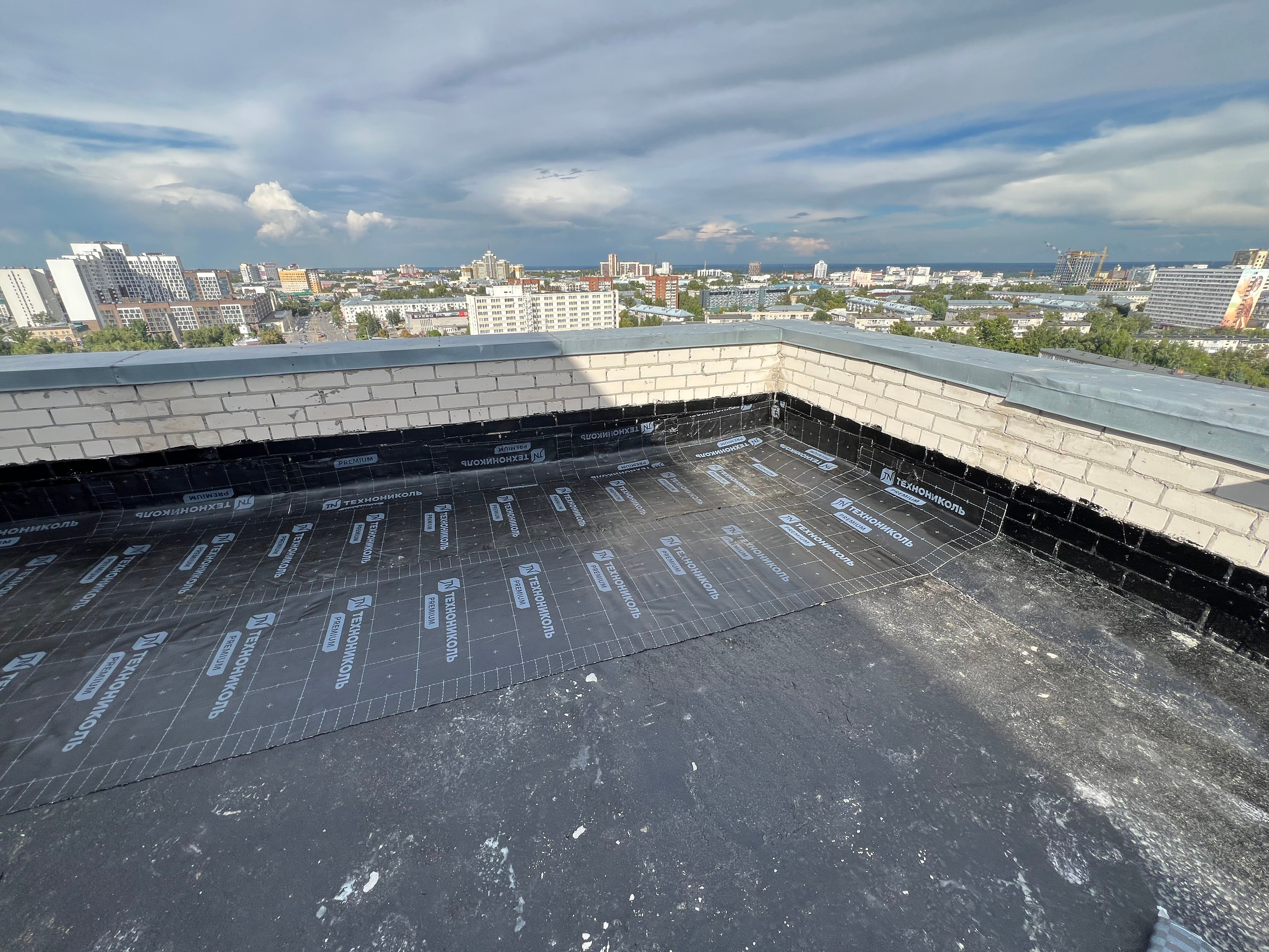 ТСЖ Строителей 33 Монтаж наплавляемой кровли