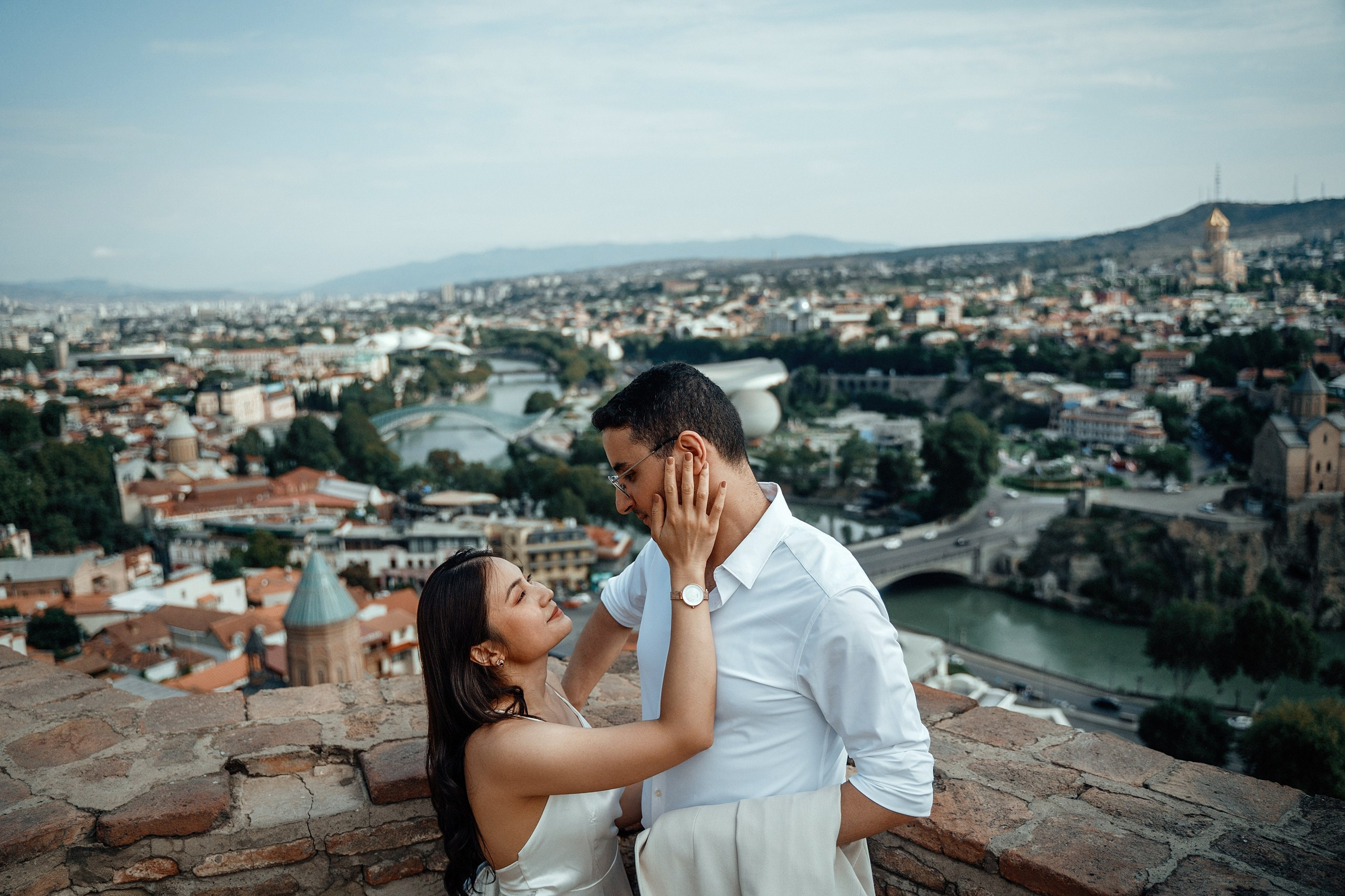 Alaeddine & Matika on the Peace Bridge in Tbilisi. Photographer Sergey Otkrytyi in Batumi & Tbilisi