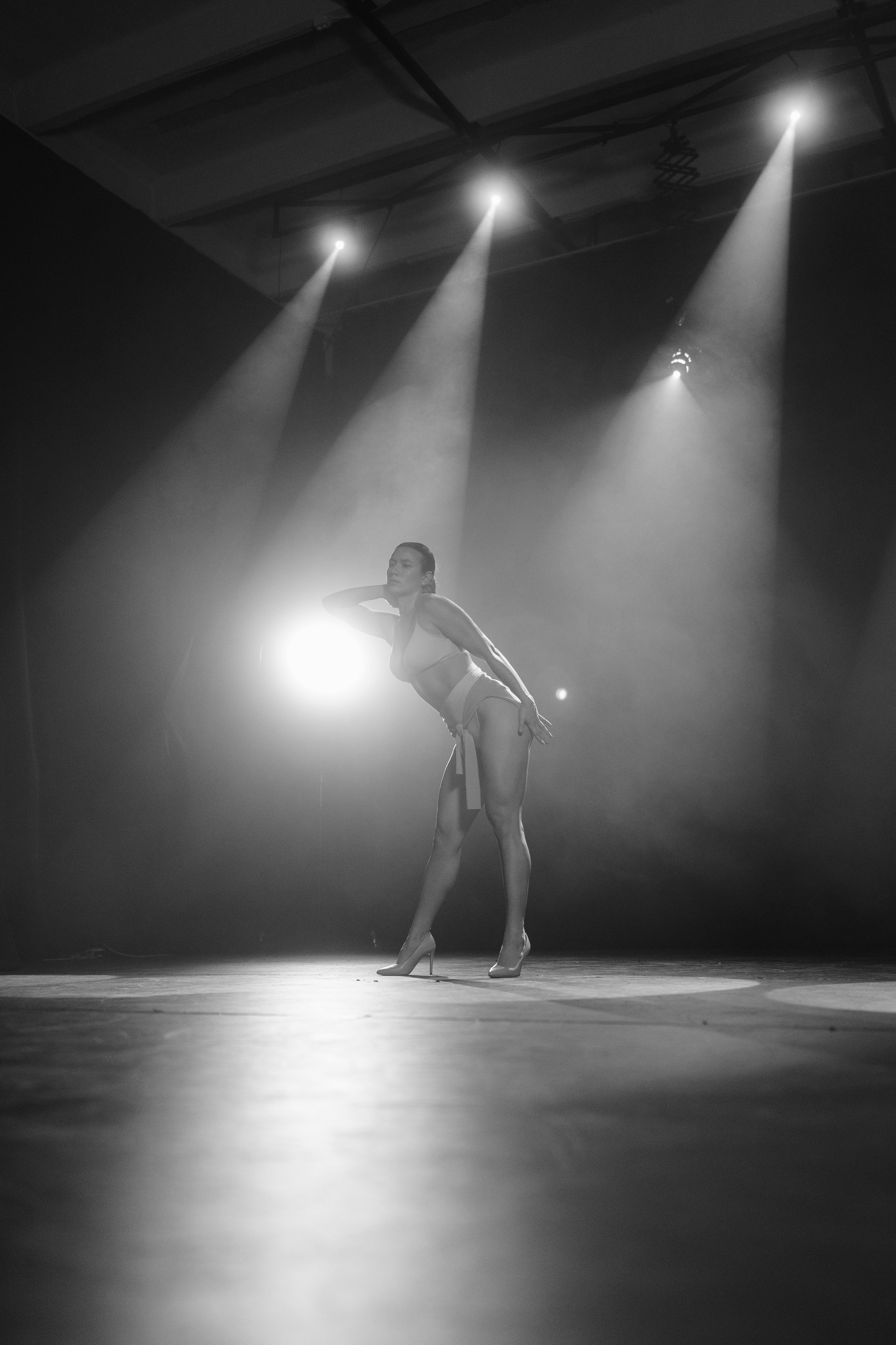 Reportage photoshoot with dancers in a cinema pavilion  by Anton Avanzato