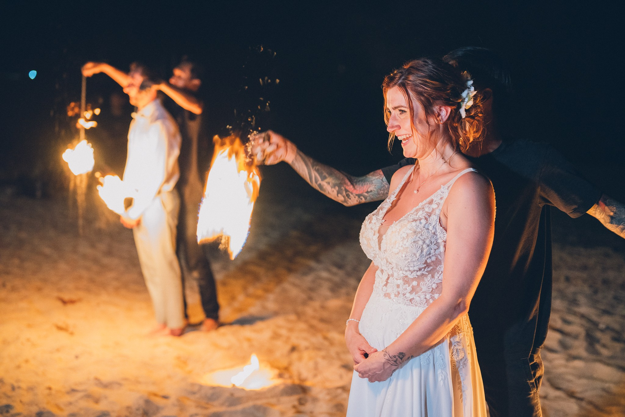 Professional fire dancers performing at a luxury wedding in Thailand