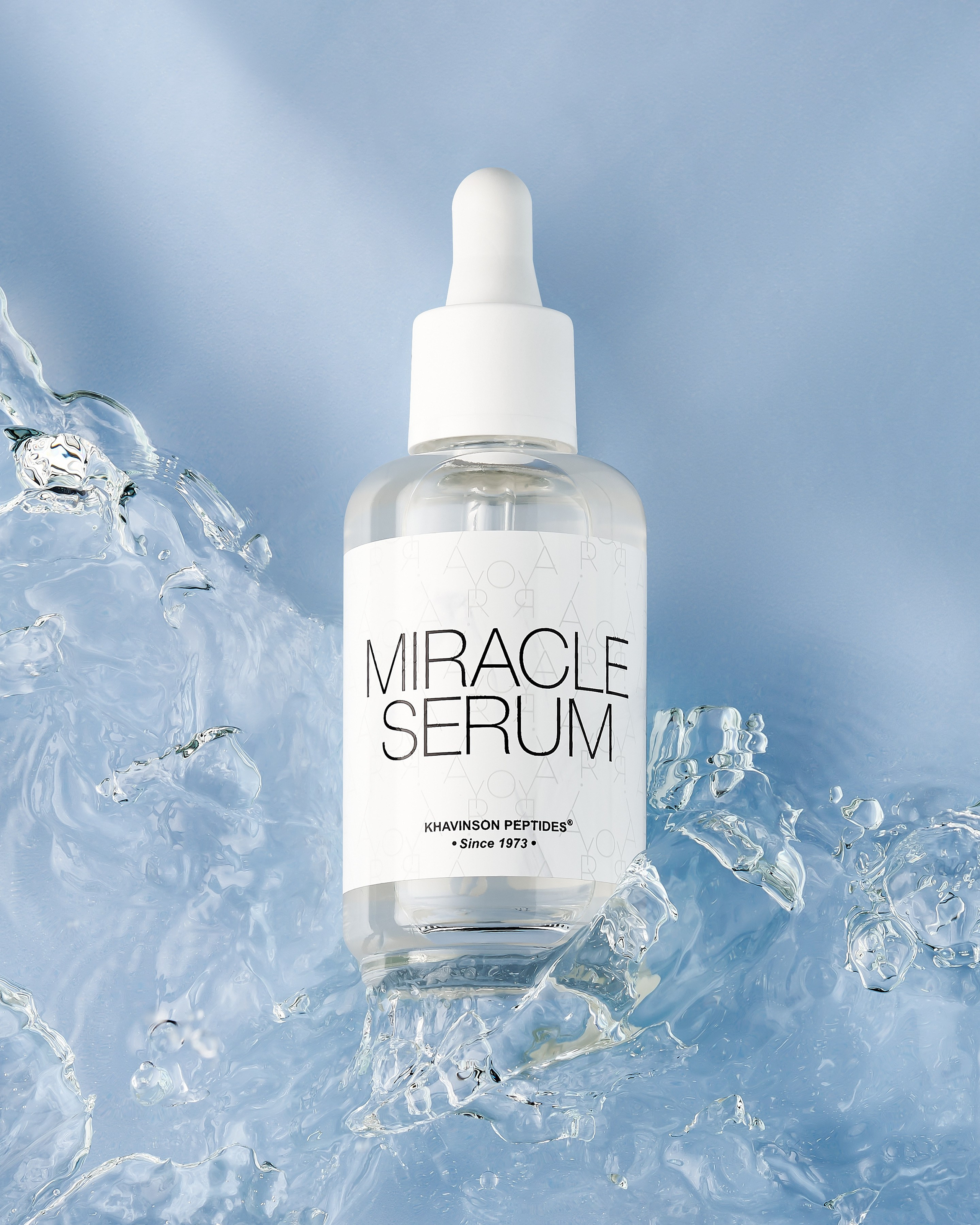 Сыворотка Miracle Serum на ледяной текстуре, передающей эффект охлаждения