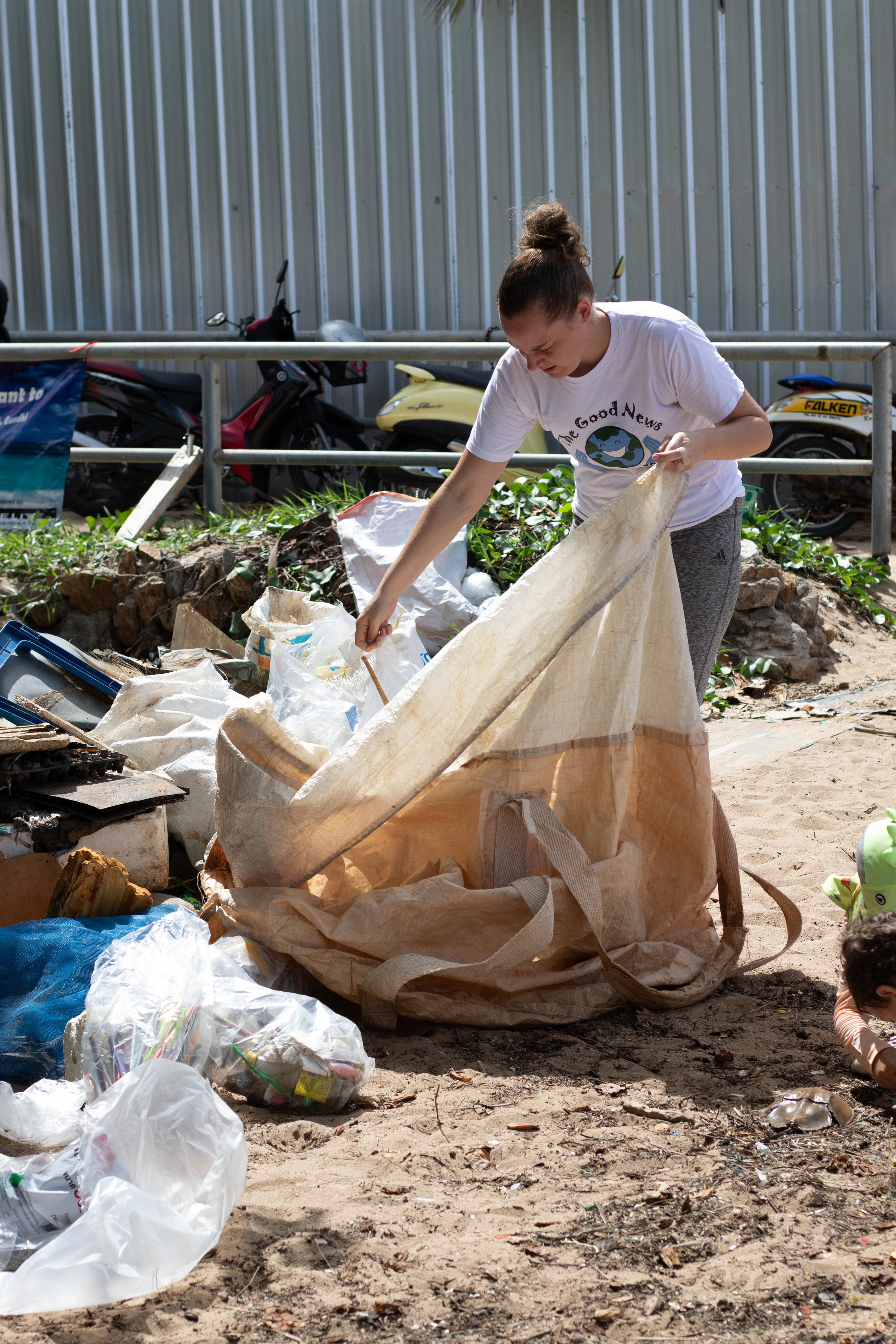 The Good News — PlanetCleanup. Portrait photographer in Thailand