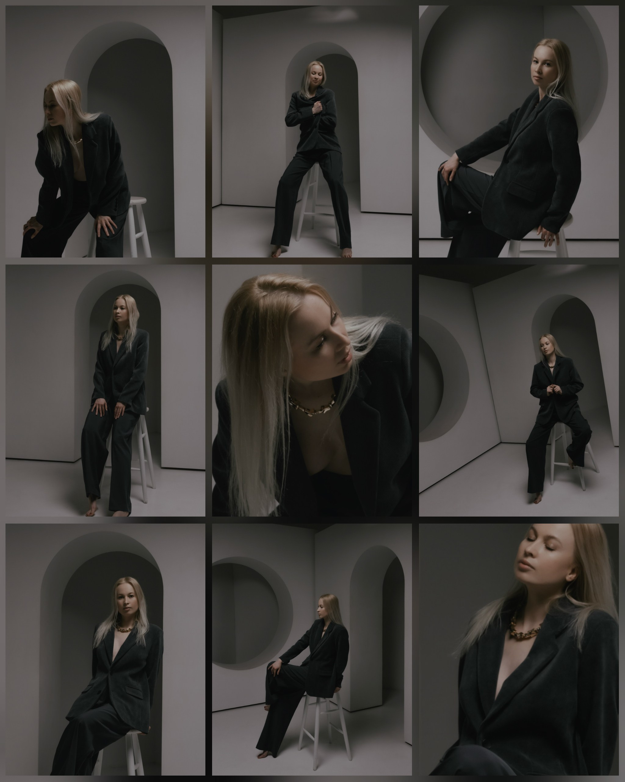 девушка в строгом костюме в белой студии на циклораме