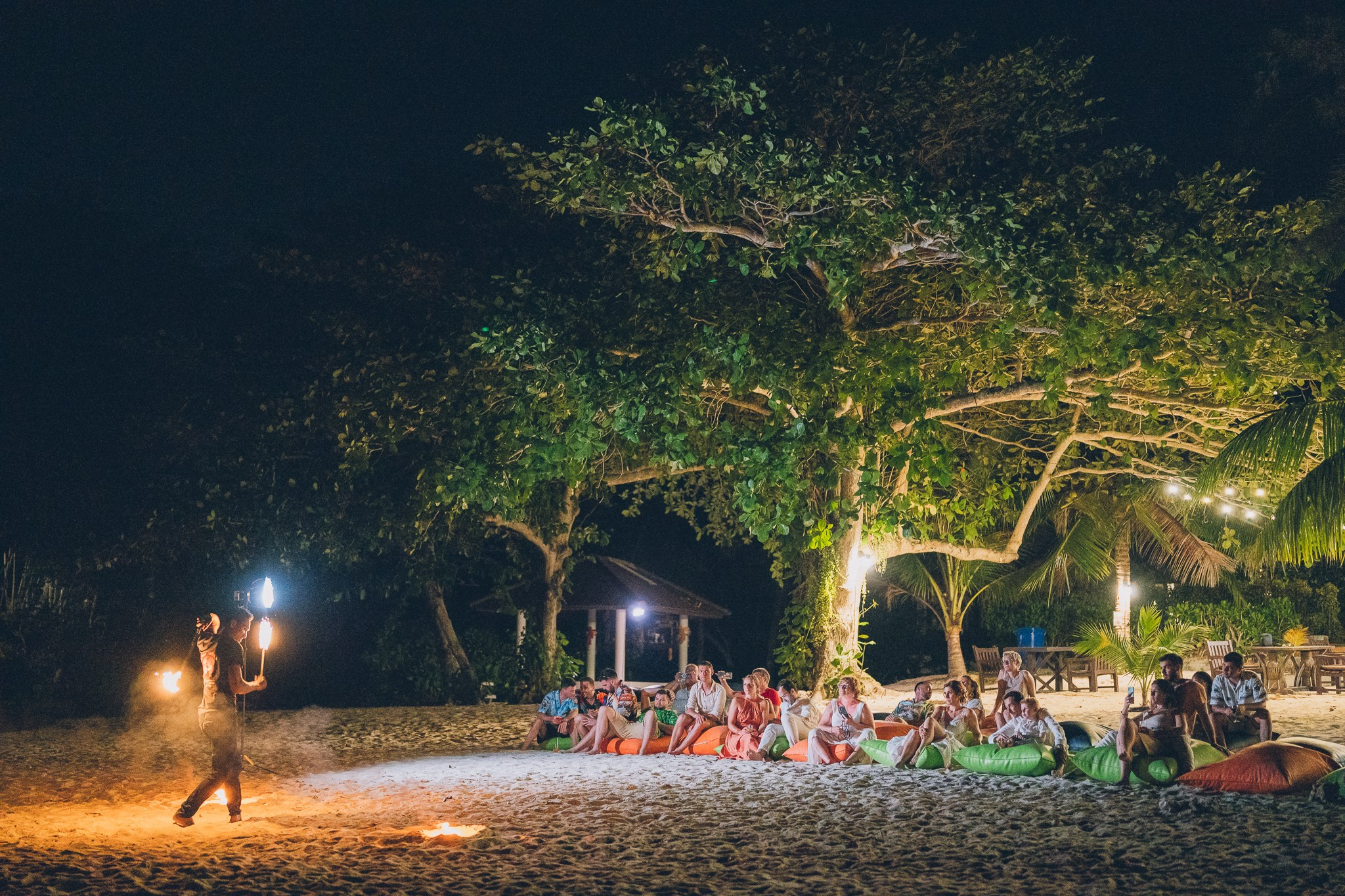Professional fire dancers performing at a luxury wedding in Thailand