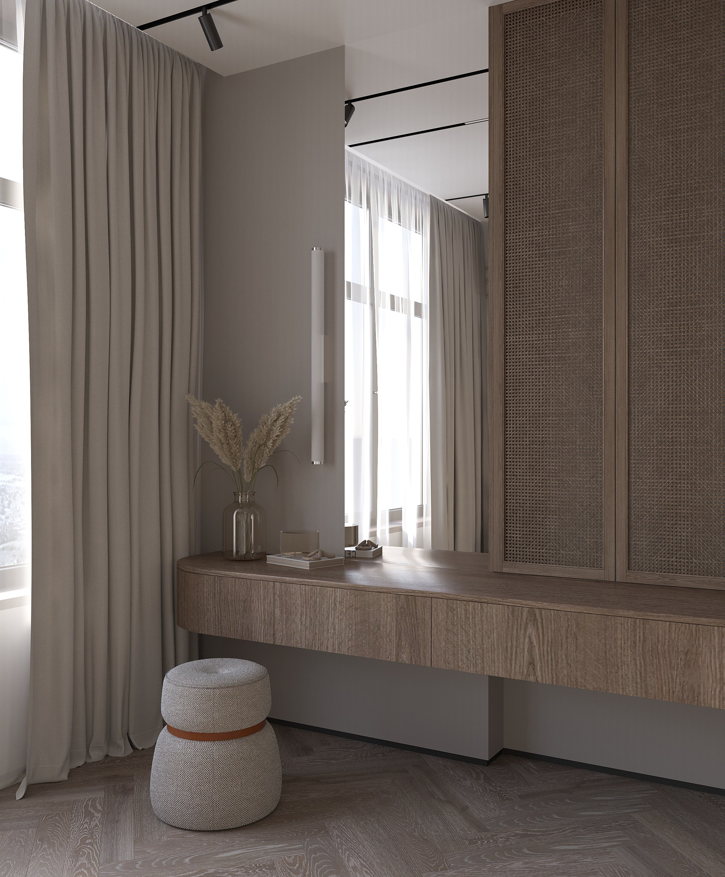 туалетный стол в спальне с большим зеркалом и мягким пуфом 