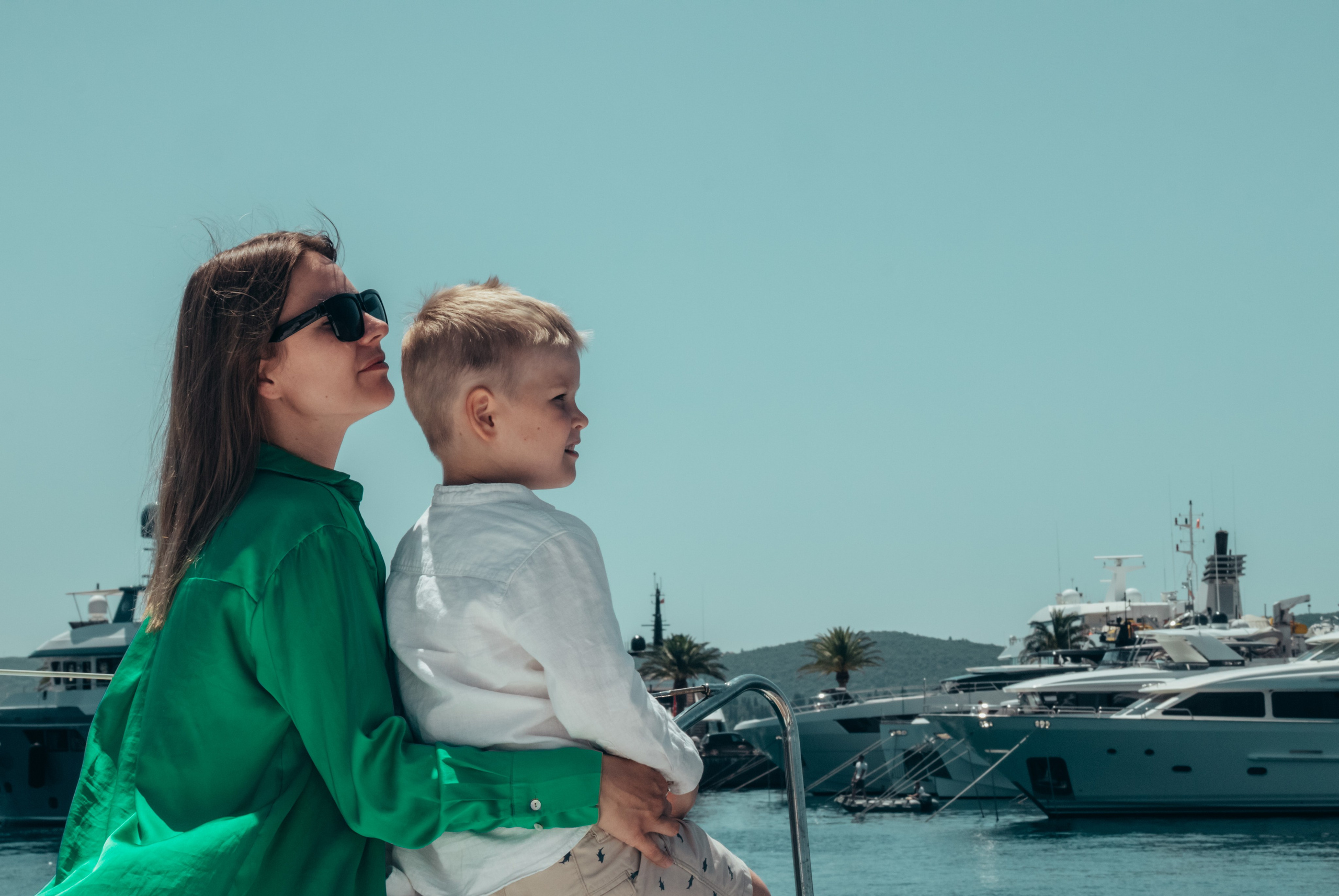 Boat tour with Anna, Roman and Tim. Portrait photographer in Tivat Montenegro Katerina Kirsanova