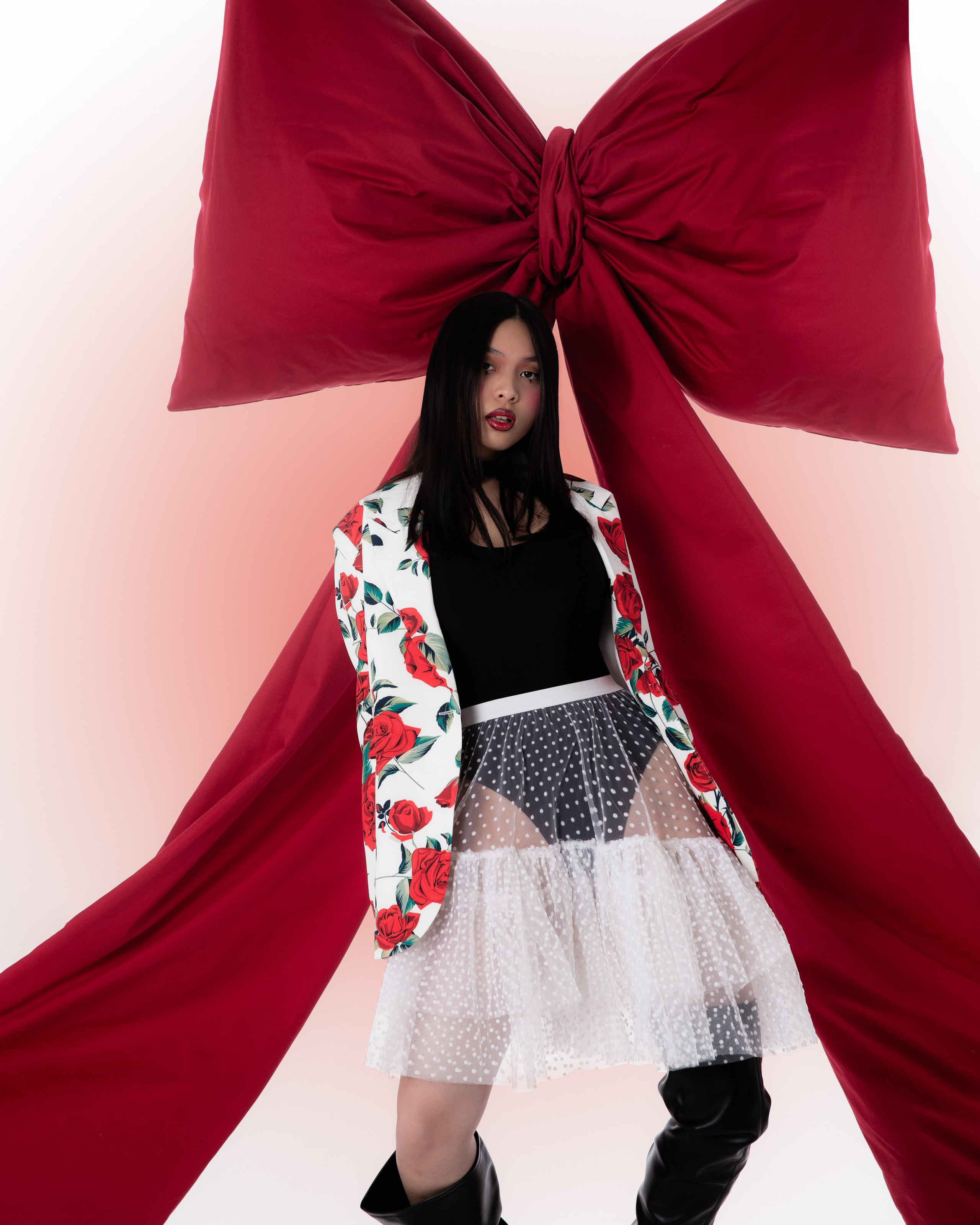 Bow. Photographer. Producer. Retoucher