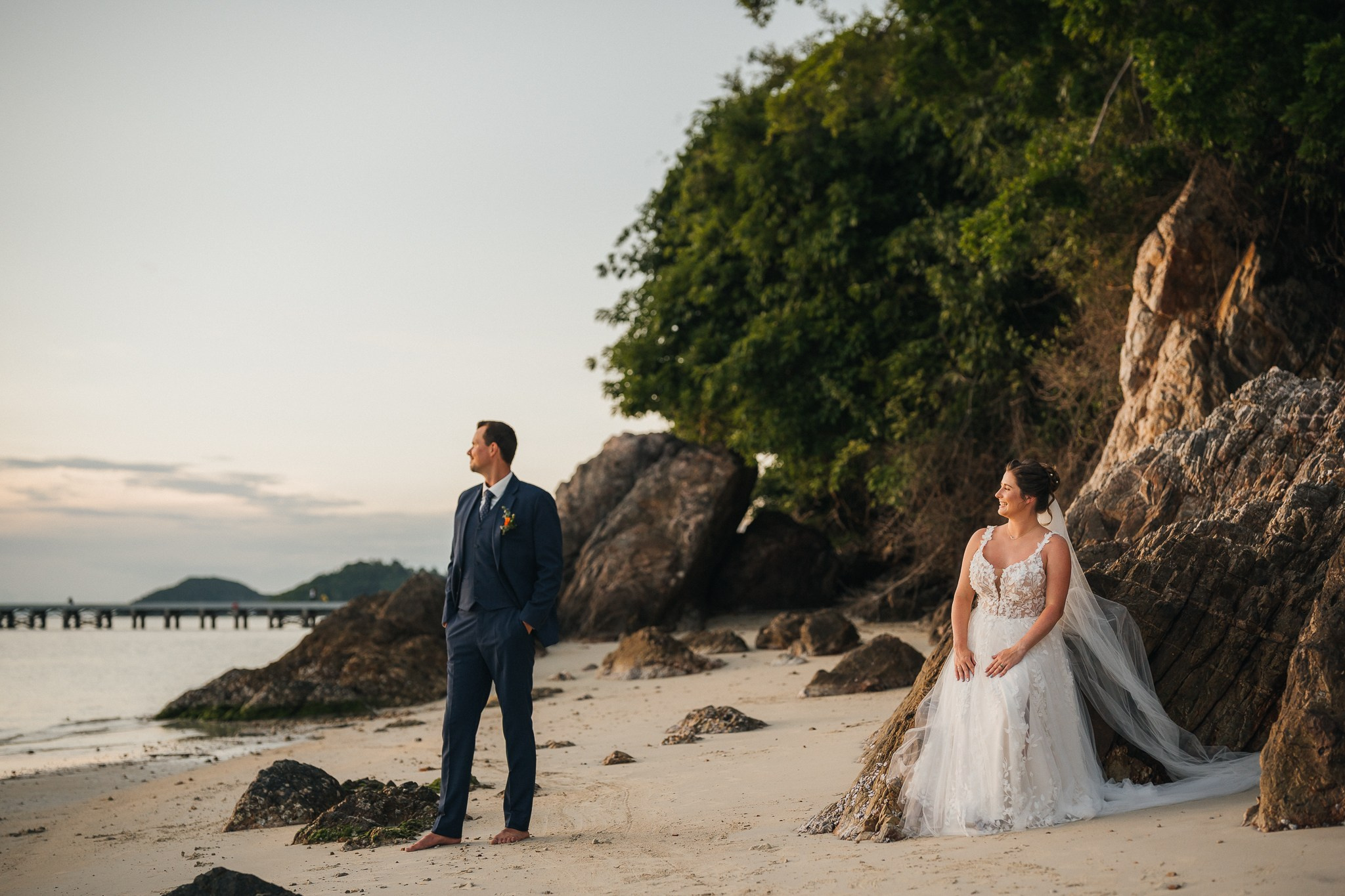 Destination beach wedding in Koh Samui, Thailand with the couple, family members and friends enjoying a tropical wedding ceremony by the sea