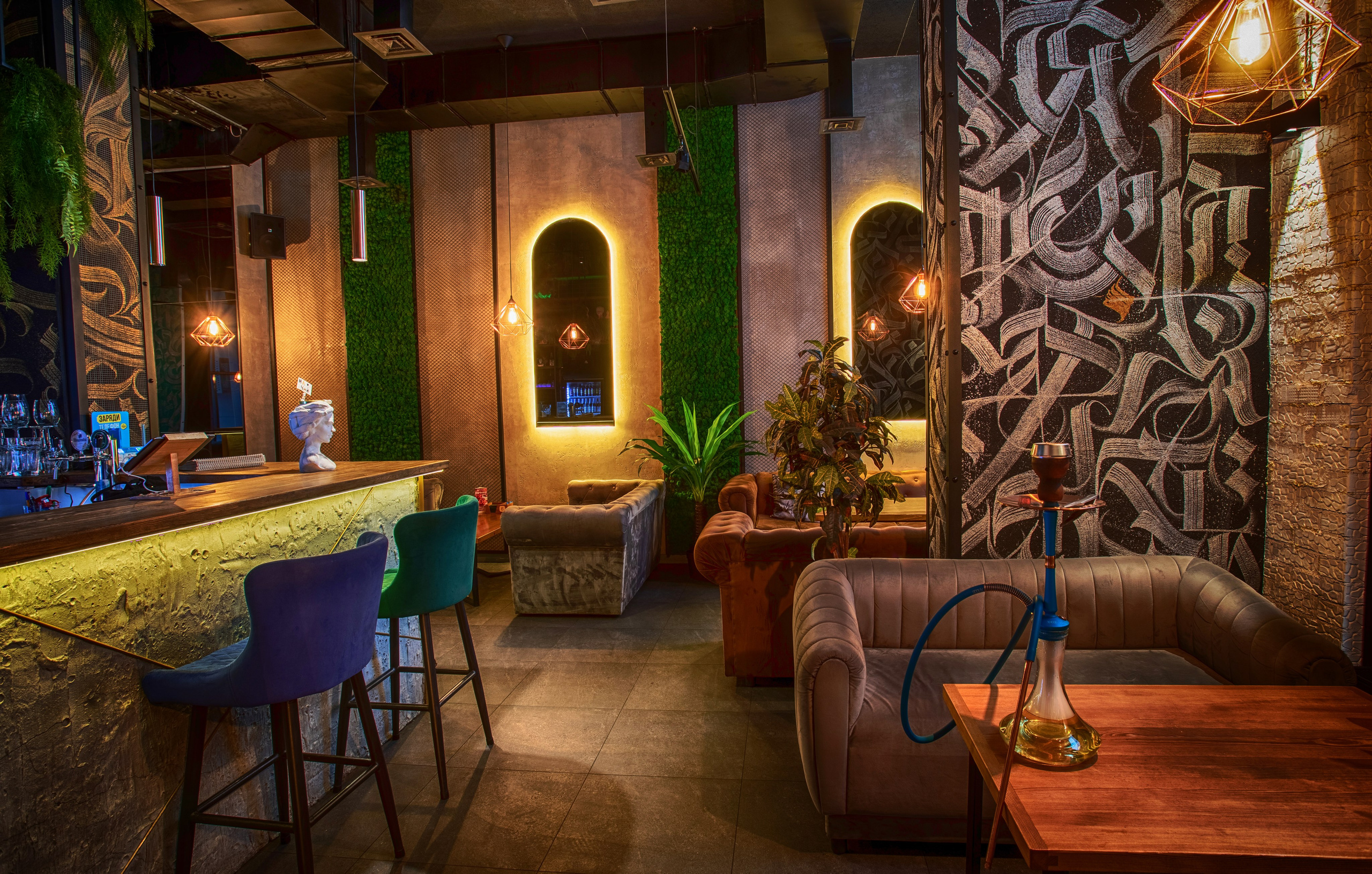 Интерьер кальянной Мята Lounge Уфа, уютная зона отдыха с кальянами, Кальянная Мята Lounge Уфа, стильный дизайн, комфортная атмосфера, Зона отдыха Мята Lounge Уфа, современные кальяны, барная стойка, Интерьер Мята Lounge Уфа, мягкие диваны, приглушённый свет, кальяны, Кальянная Мята Lounge Уфа, место для расслабления, общения, Мята Lounge Уфа, атмосфера уюта, дыма кальянов, Кальяны, релакс, Мята Lounge Уфа, Стильный лаунж, Мята Lounge Уфа, Уютный лаунж, кальяны, Мята Lounge Уфа, Расслабление, Мята Lounge Уфа, кальяны, комфорт, Тёплая атмосфера лаунжа, Мята Lounge Уфа, мягкие кресла, дым кальянов, приятная музыка, Расслабляющий интерьер, Мята Lounge Уфа, идеальное место для вечера, Современная кальянная, Мята Lounge Уфа, стиль, комфорт, атмосфера, Уютный лаунж-пространство, Мята Lounge Уфа, изысканные кальяны, Мята Lounge Уфа, стиль, комфорт, дым кальянов, Барная стойка, кальяны, лаунж, Мята Lounge Уфа, Современные кальяны, интерьер, Мята Lounge Уфа, Декор лаунжа, Мята Lounge, стильные элементы, Уфа, Зона кальянов, Мята Lounge Уфа, уют, стиль, Атмосфера лаунжа, мягкие диваны, кальяны, Мята Lounge Уфа