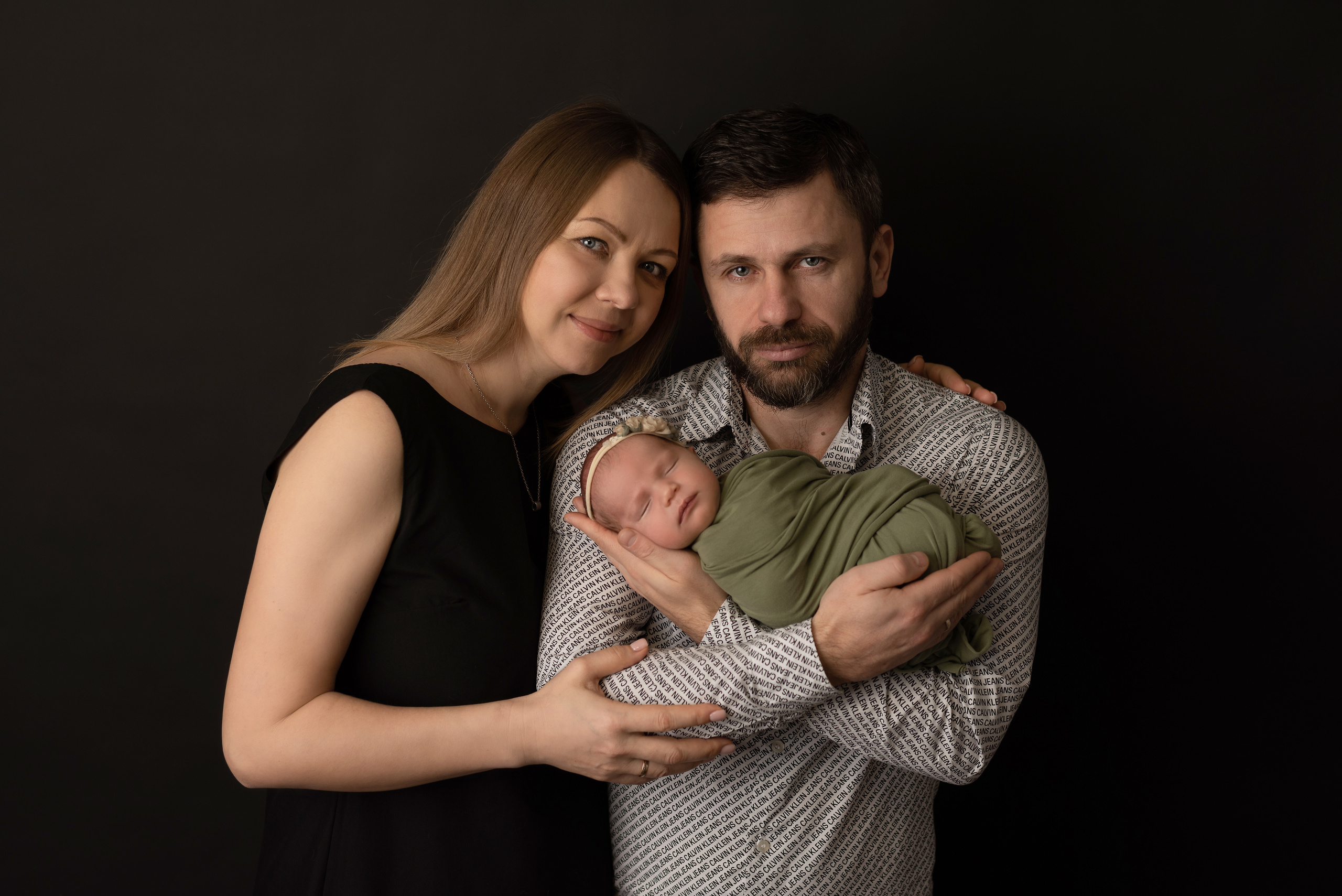 Beautiful family photo with a newborn