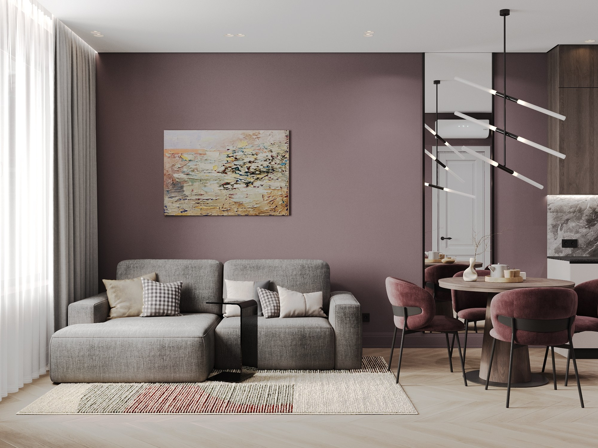 дизайн интерьера кухни-гостиной в сложных сливовых тонах, серый диван и зеркало у обеденного стола, кухня в современном стиле