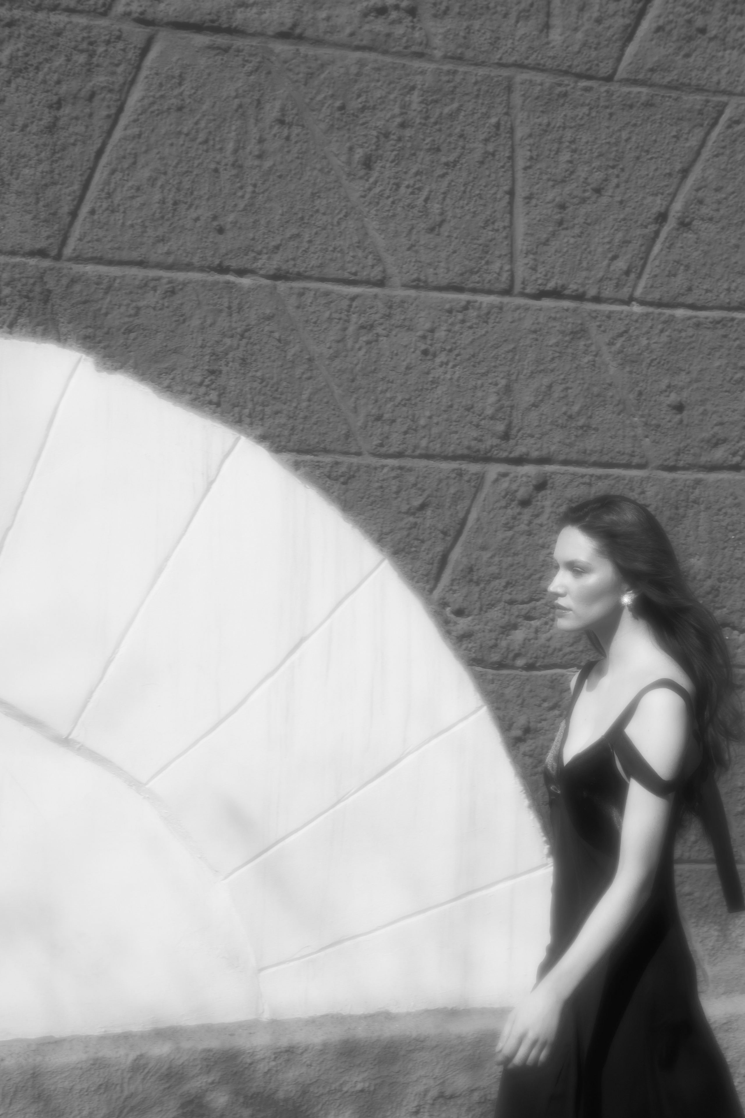 Black coat walking. Fashion Photographer Oxana Chernomorets