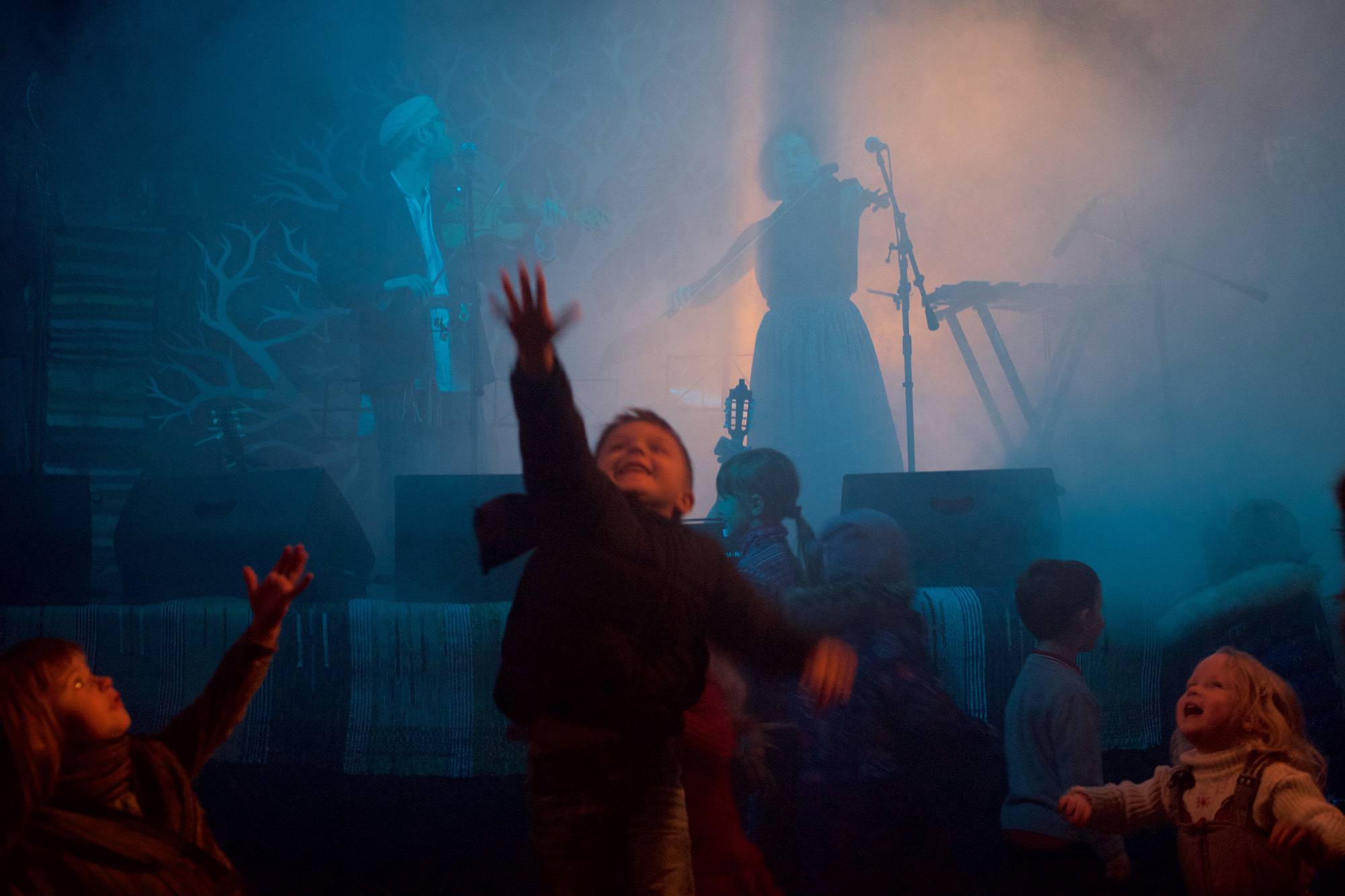 Children having fun during a concert by Otawa Yo.