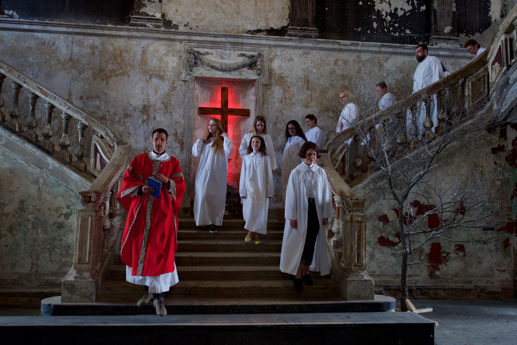 Pastor Eugene and parishioners prepare for Confirmation. Confirmation in Lutheranism is a personal awareness of the faith of the faith. During the solemn service, the confirmants put on special white festive clothes.