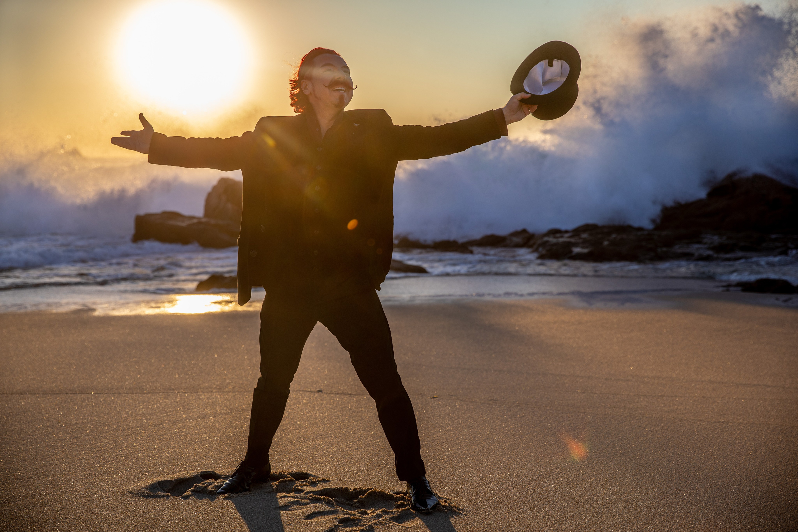 Photo shoot for a magician with a red moustache