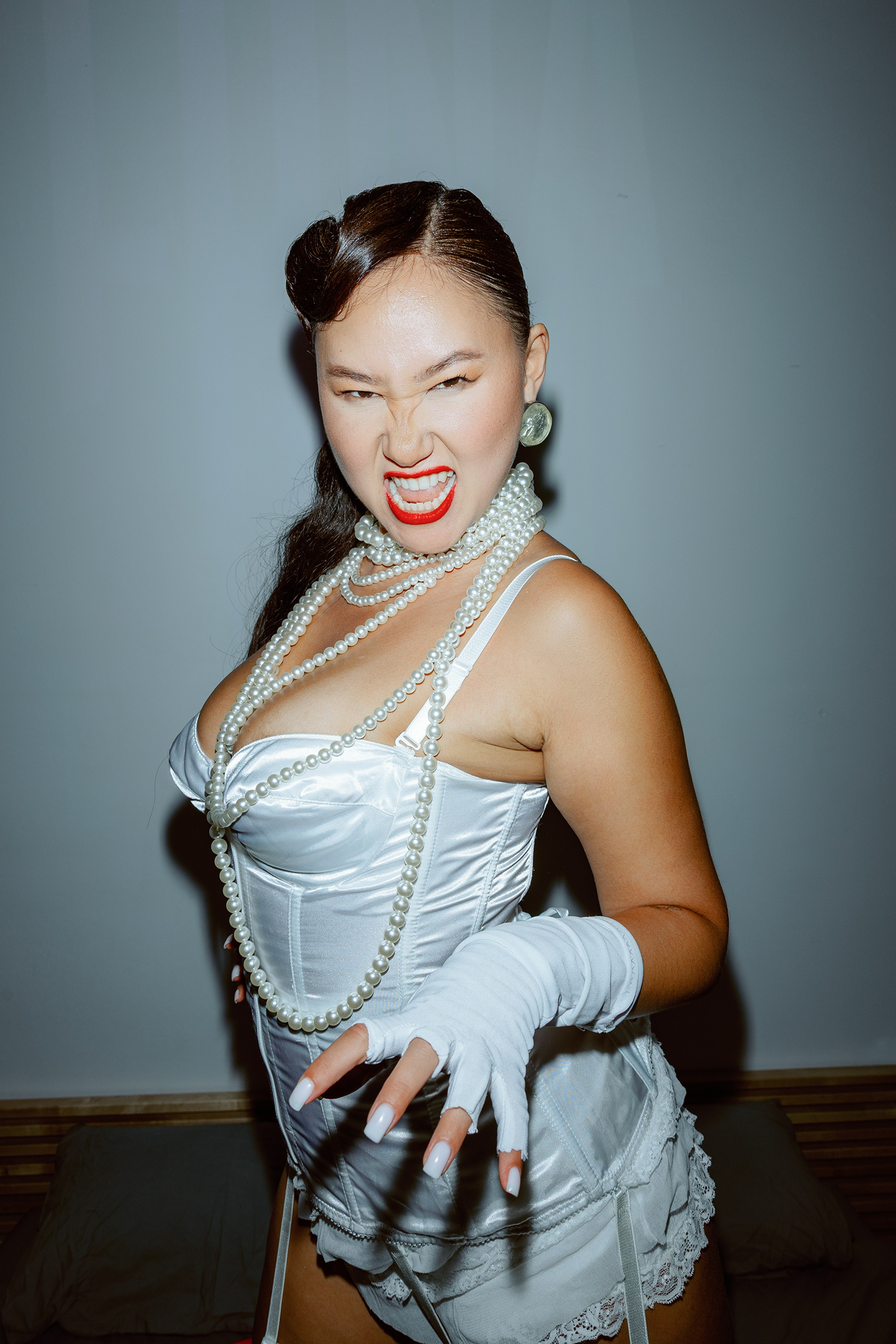 Birthday girl laughing with friends during an intimate celebration