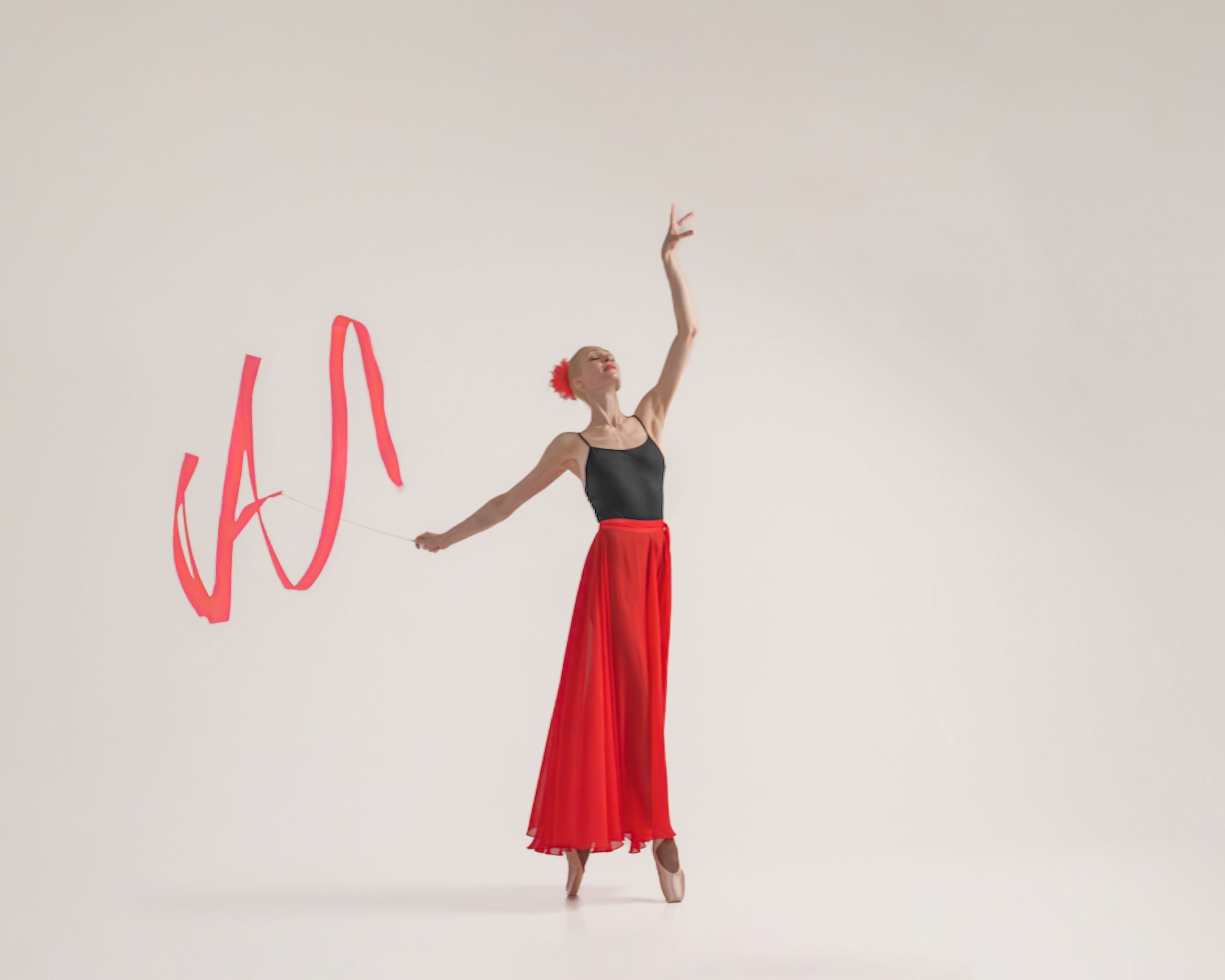 A photo shoot with a rhythmic gymnastics ribbon. Studio photo shoot in Yekaterinburg. Athlete, master of sports in rhythmic gymnastics