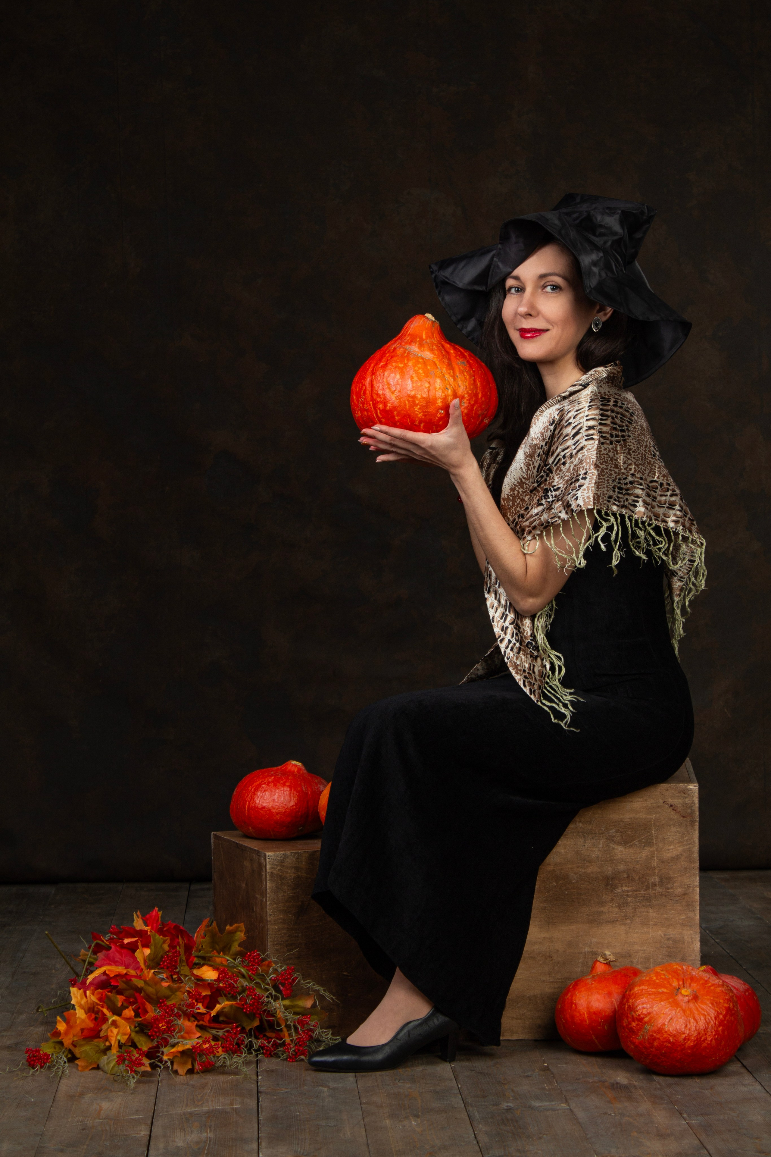 Девушка с тыквами хелуинскими
