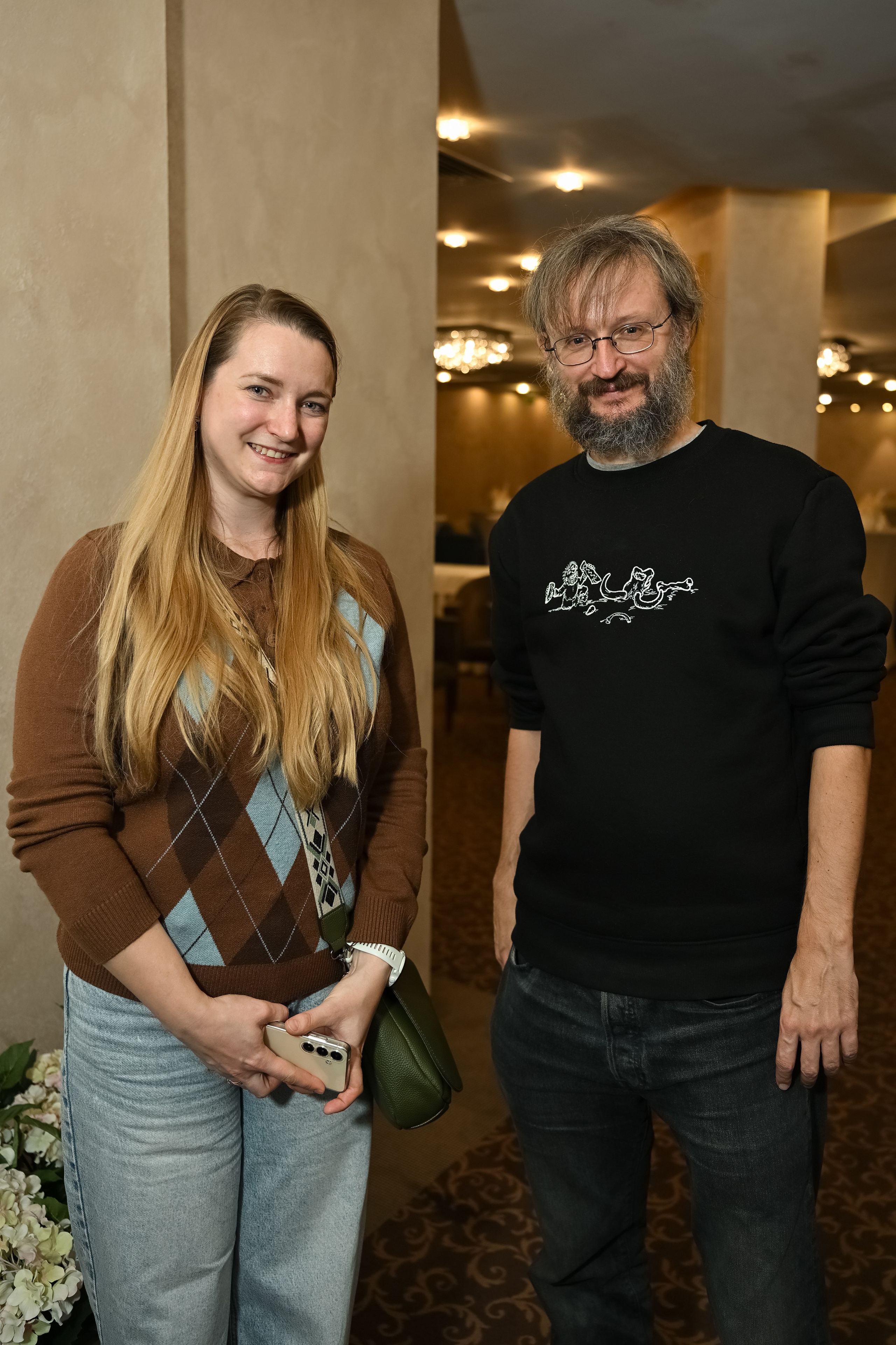 Фотограф Алексей Клейменов снимает научно-популярное мероприятие в Казани с выступлением приглашенного специалиста