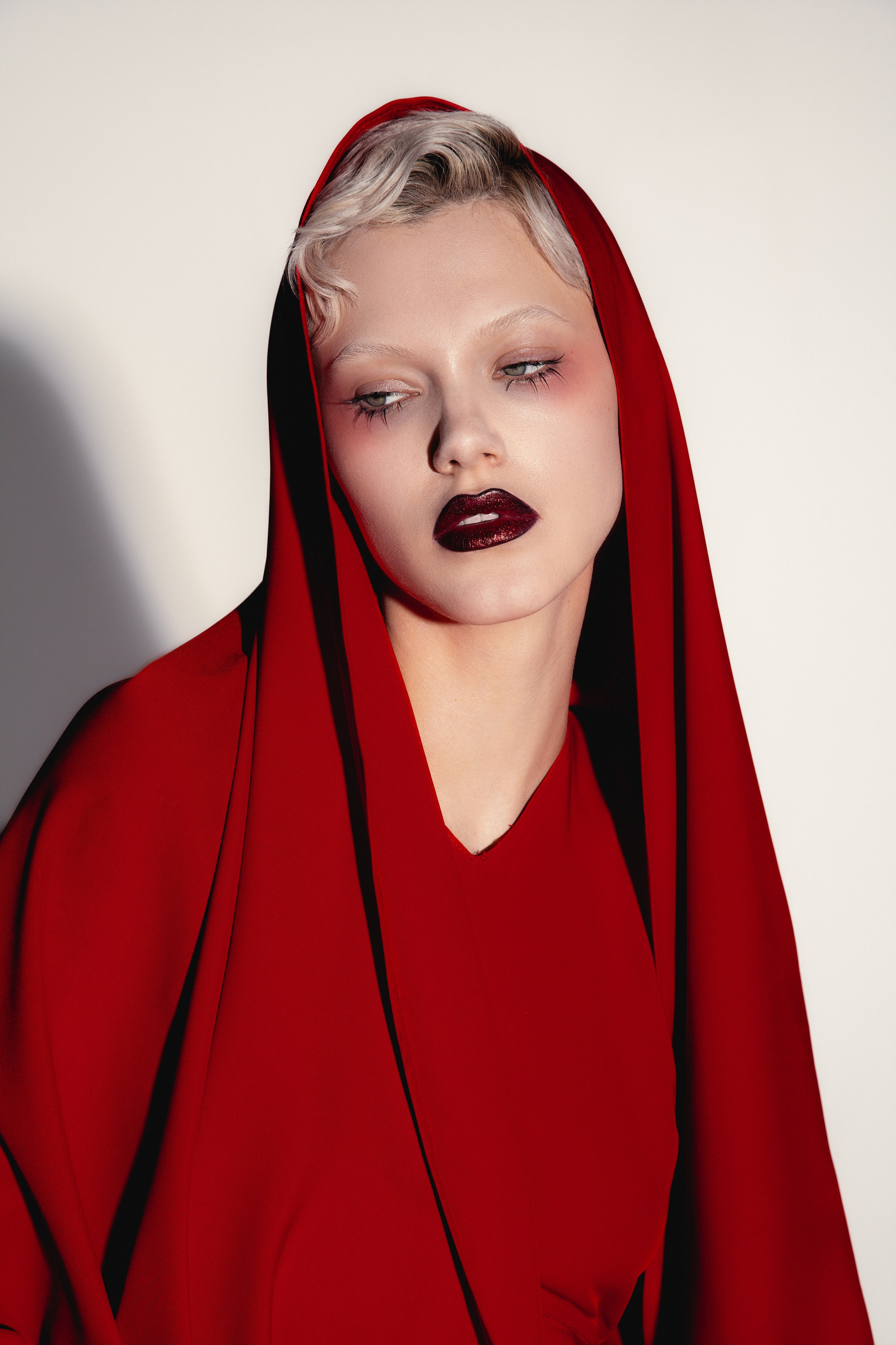 Red. Photographer. Producer. Retoucher