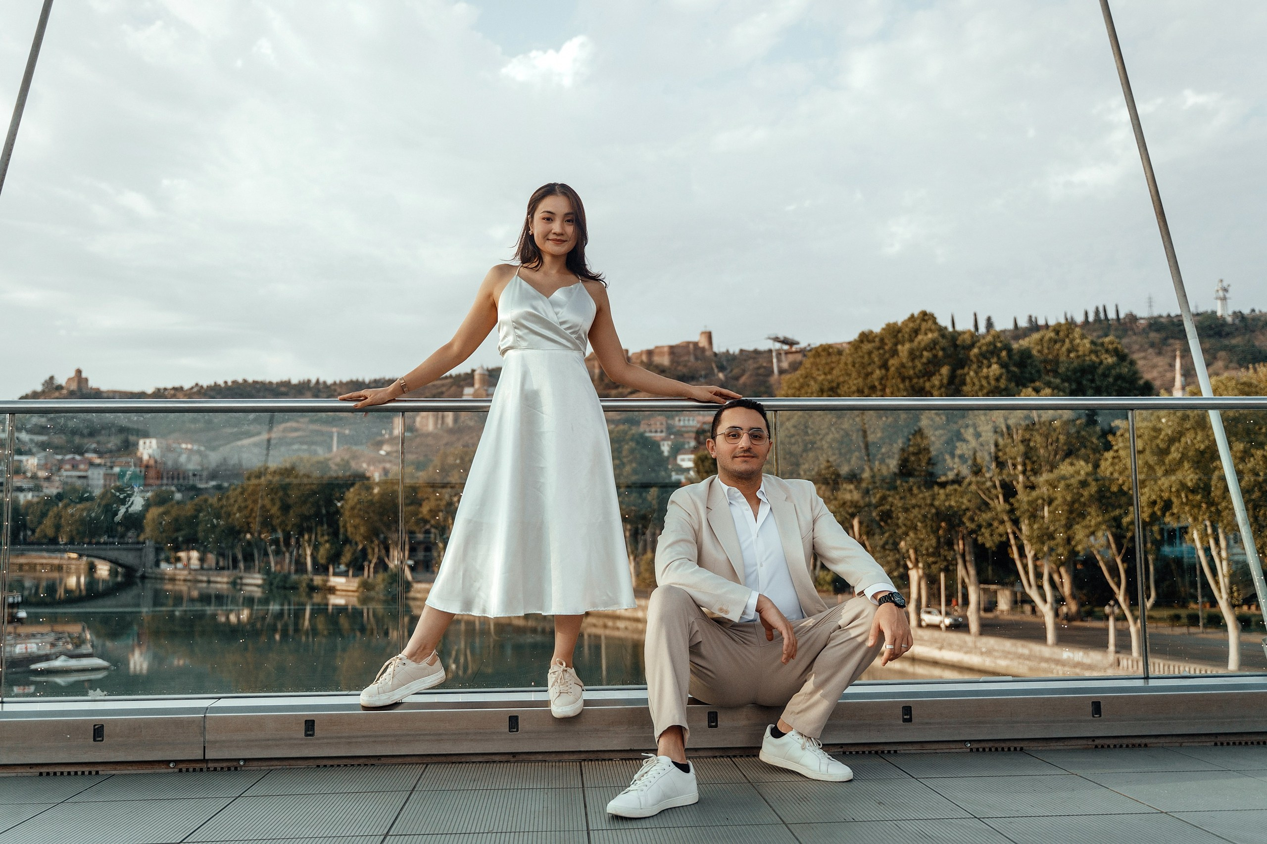 Alaeddine & Matika on the Peace Bridge in Tbilisi. Photographer Sergey Otkrytyi in Batumi & Tbilisi