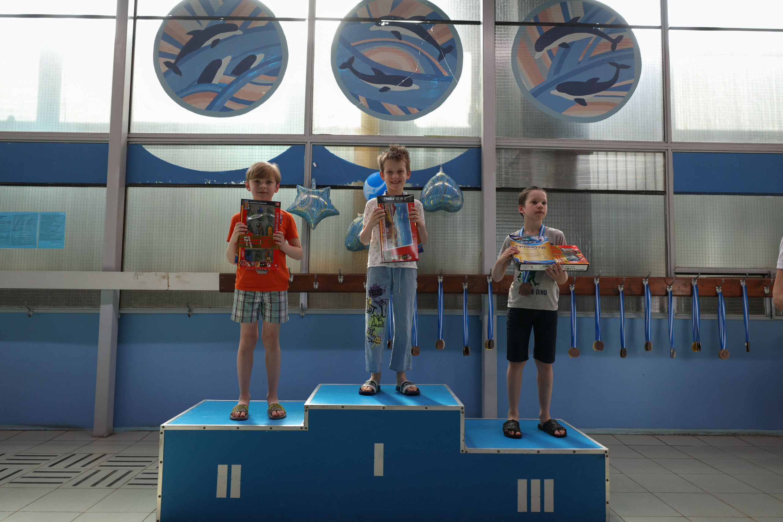 Веселый дельфин. Плавание. Дети 8-9 лет. Фотограф Александр Заломаев